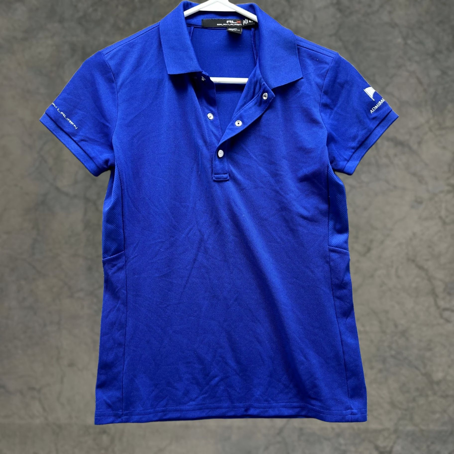 Ralph Lauren Ralph Lauren Polo Shirt Women XS Blue Solid Short Sleeve Collared Button Polo Fashion Size XS / US 0-2 / IT 36-38 - 1 Thumbnail