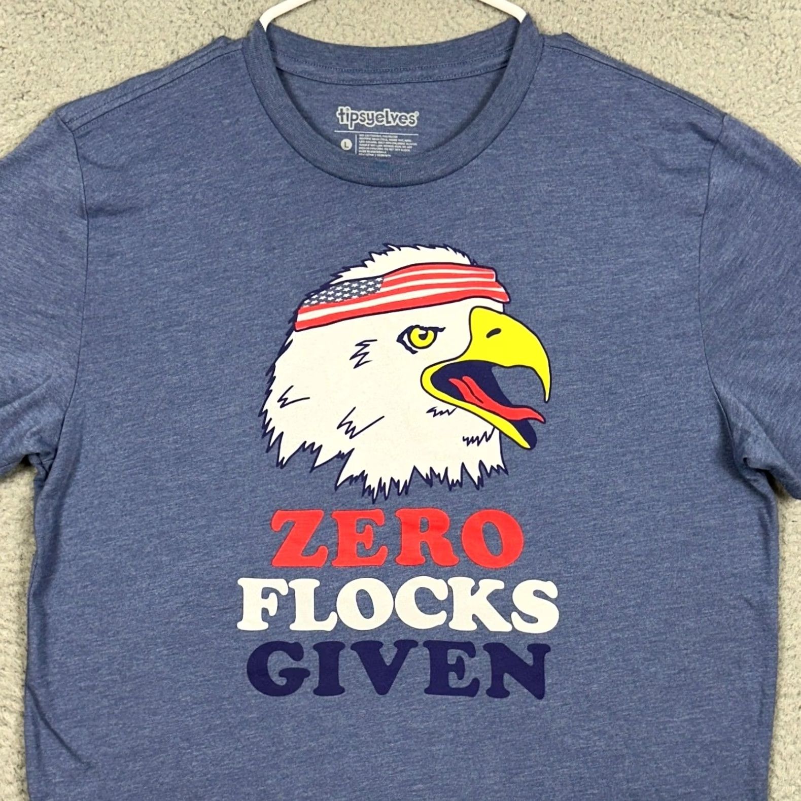 Vintage Tipsy Elves T-Shirt Mens L Blue Graphic Tee Eagle Zero Flocks Given Graphic Print Crew Neck Short Sleeve Patriotic Funny Animals EUC Size US L / EU 52-54 / 3 - 2 Thumbnail