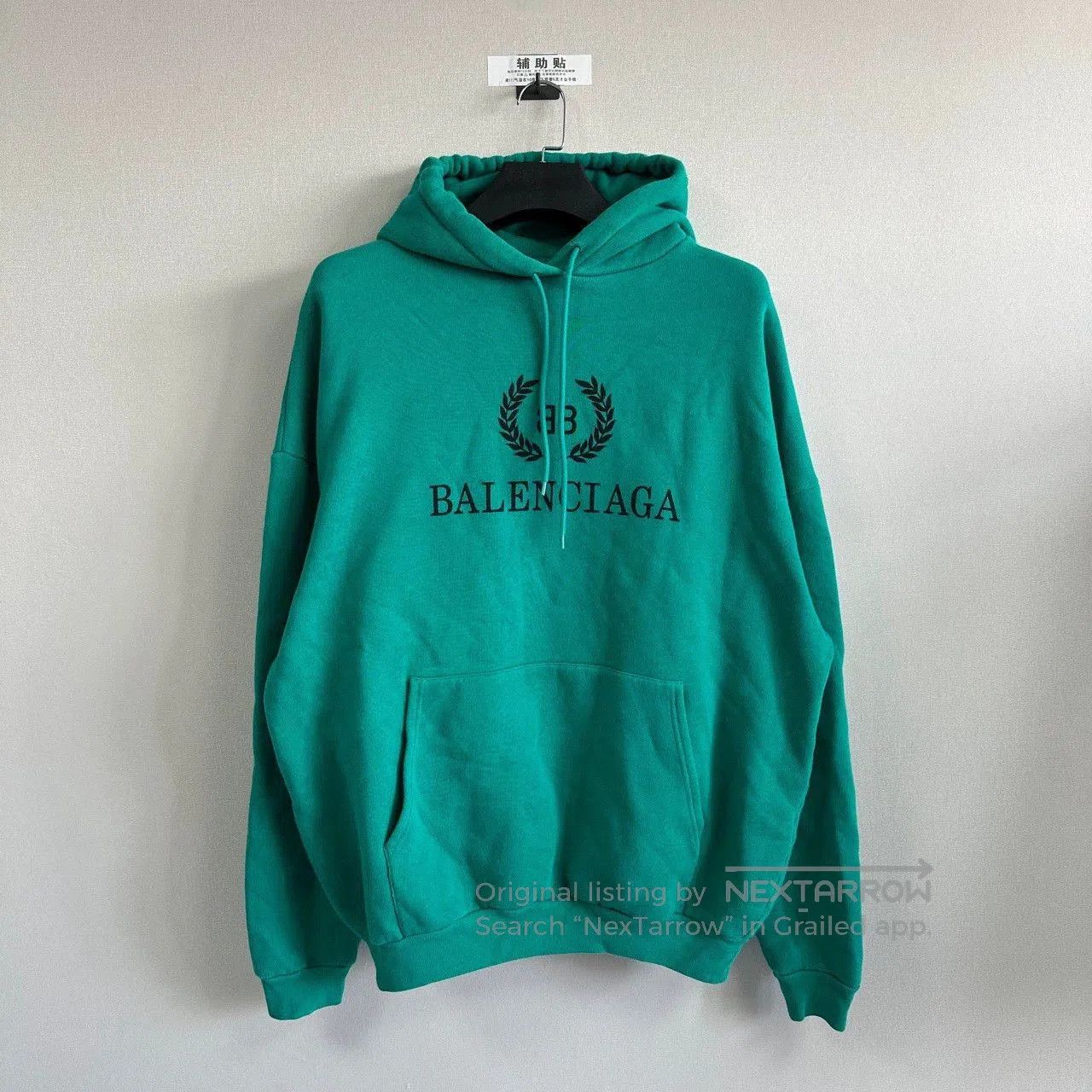 balenciaga teal green oversized hoodie.