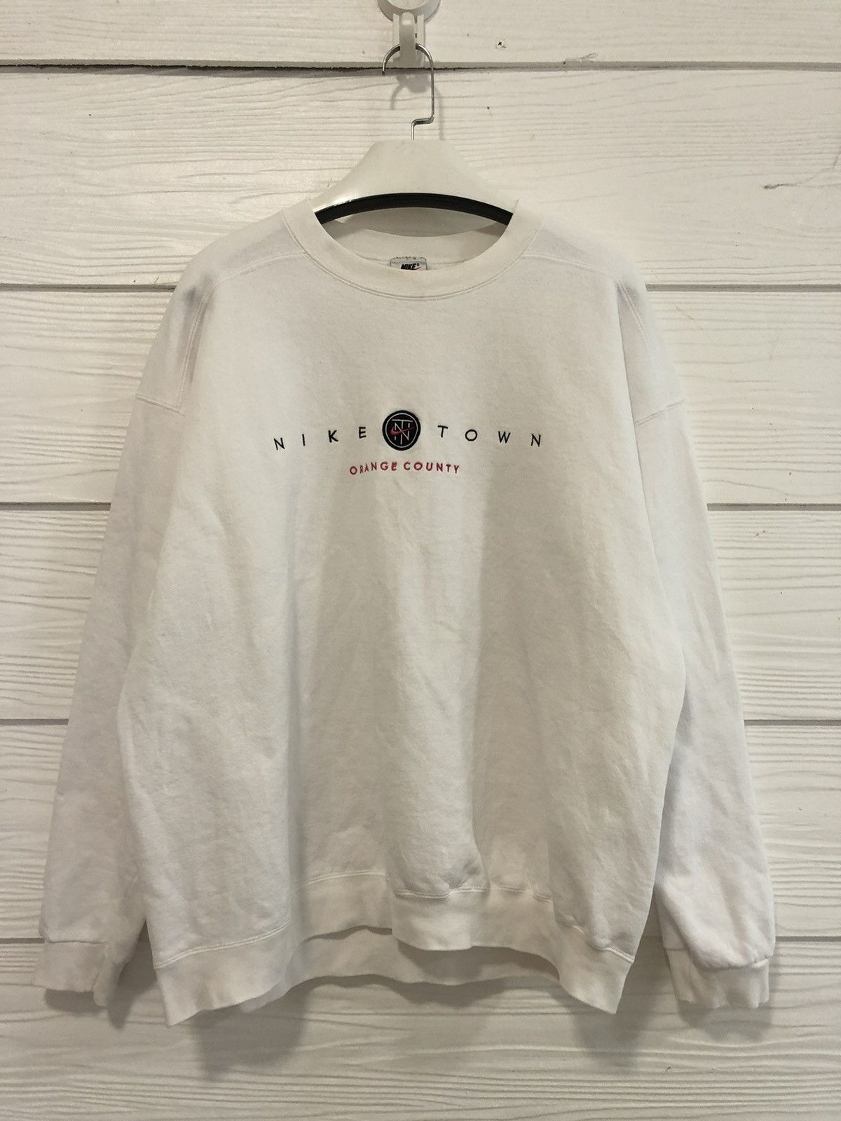 image of 90’S Nike Town Orangecounty Centre Swoosh Sweatshirt in White, Men's (Size Large)