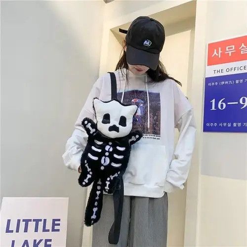image of Bag x Vintage Skull Plush Backpack in Black, Men's