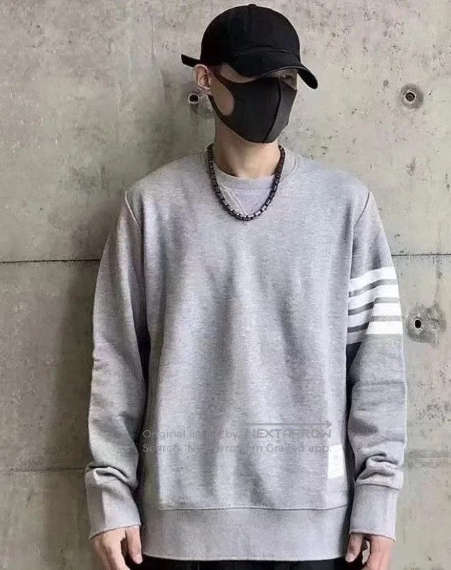 thom browne grey striped sweatshirt for men.