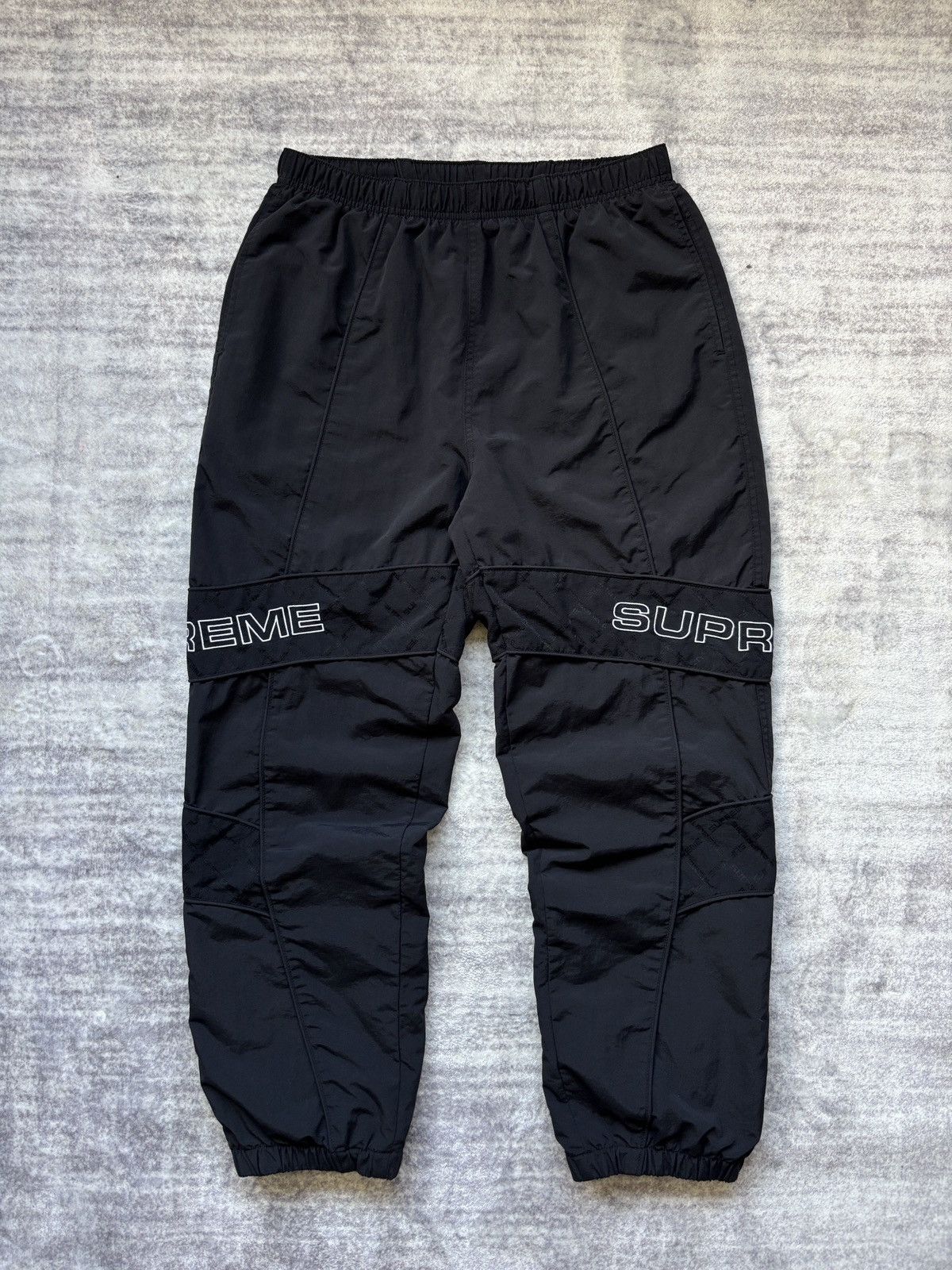 Supreme Supreme World Famous track jacquard track pants | Grailed