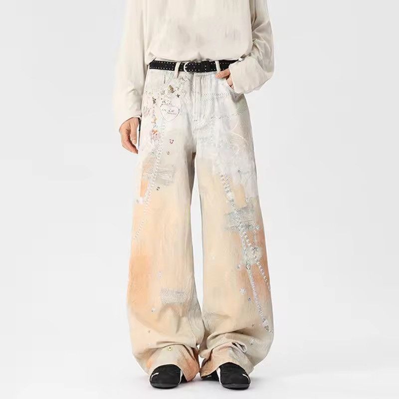Orange and cream wide leg jeans with a unique design