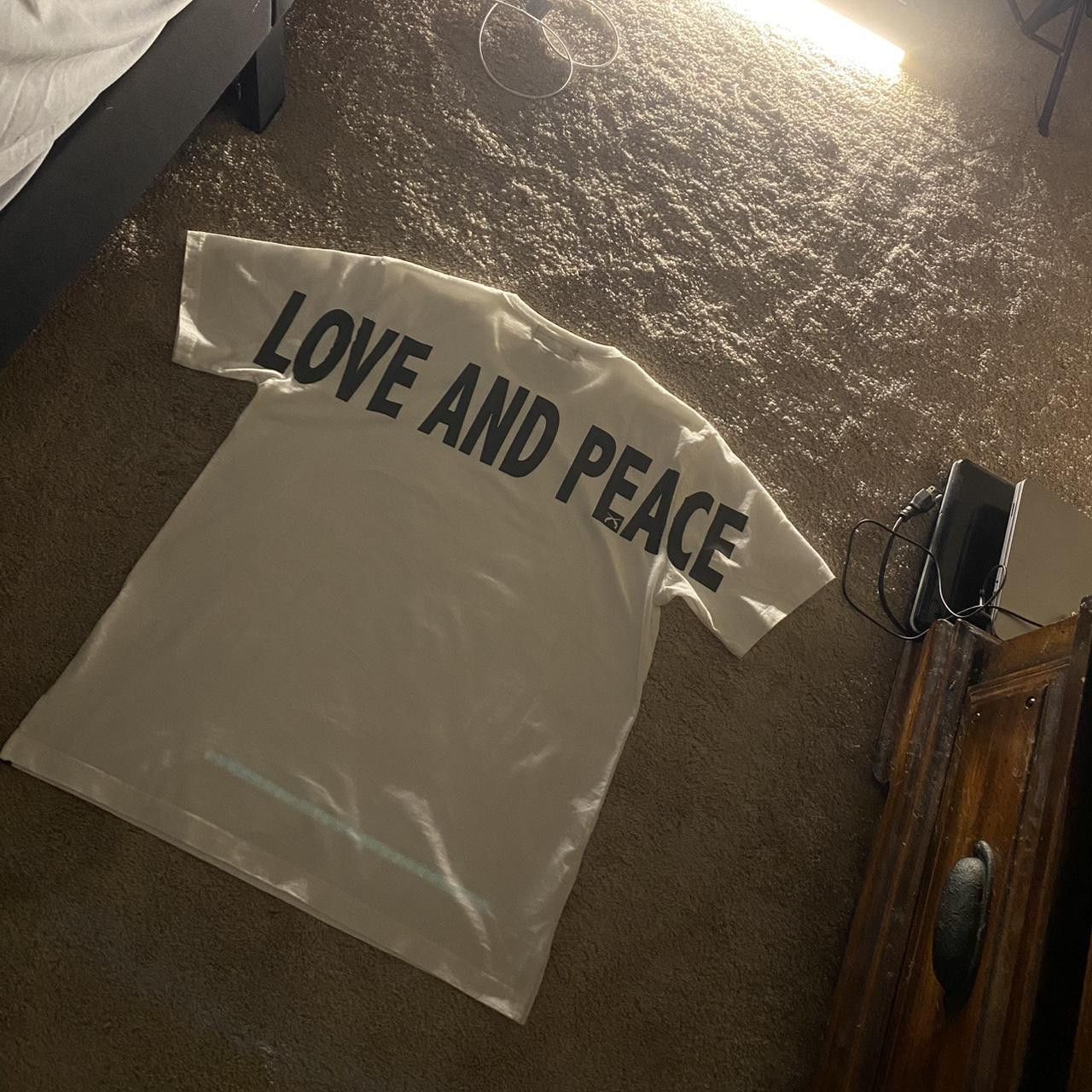 14th Addiction 14th Addiction Feather wing Print Tee | Grailed