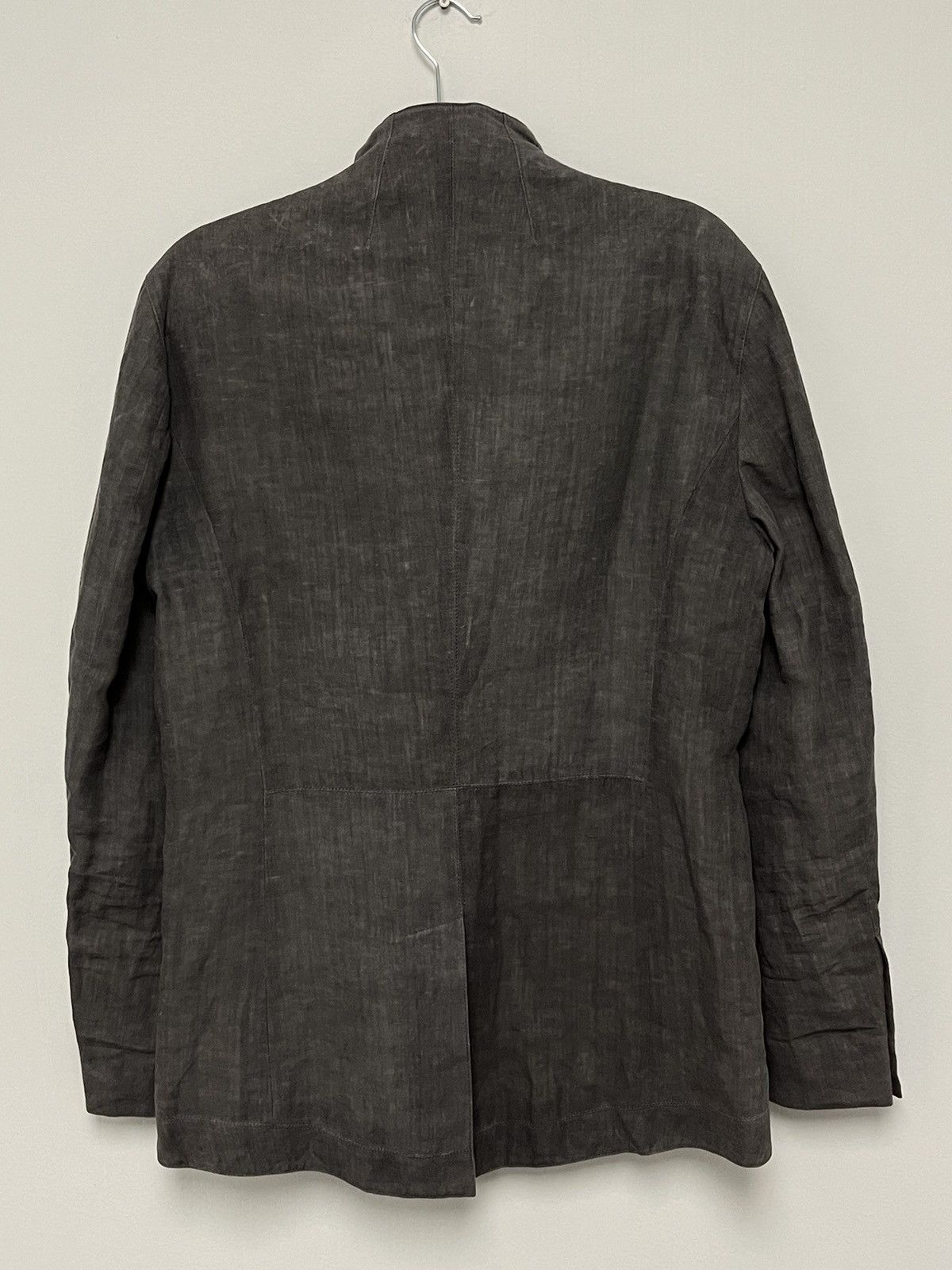 Multibutton cutaway jacket. 48