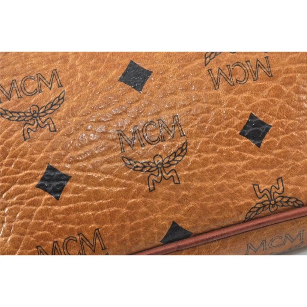 MCM MCM Brown Clutch with Logo Pattern and Wrist Strap Size ONE SIZE - 12 Thumbnail
