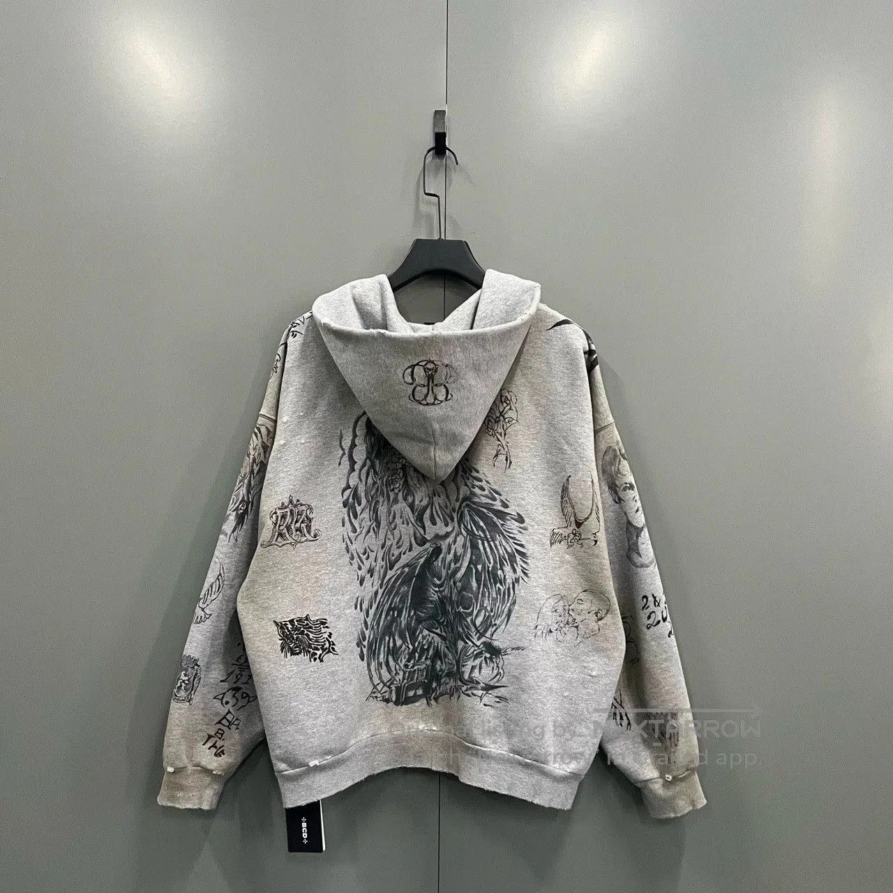 balenciaga graffiti print oversized hoodie.