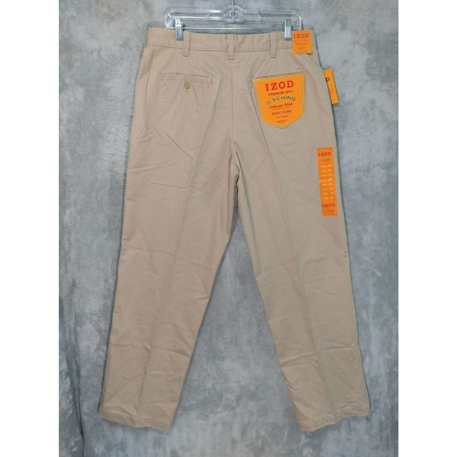 Izod IZOD Pants Mens 34x32 Beige Chino Flat Front Metrix Fit Easy Care Cotton Regular 34 Beige Men Pants Mens Chino 90s? (no, avoid inaccuracies) Size US 34 / EU 50 - 2 Thumbnail