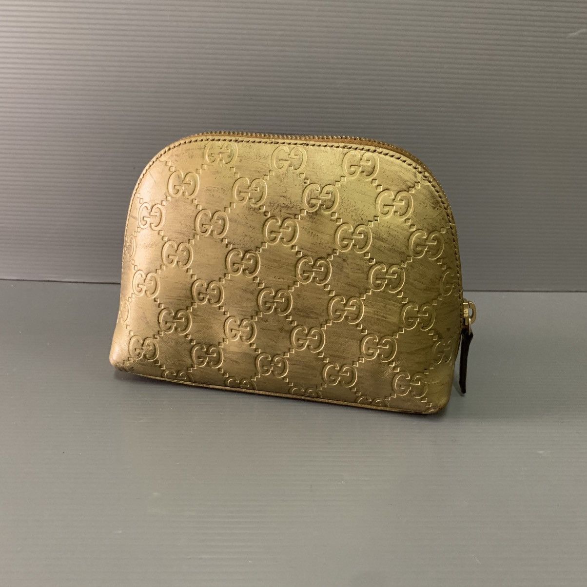 Gucci Monogram Leather Gold Makeup Clutch Bag