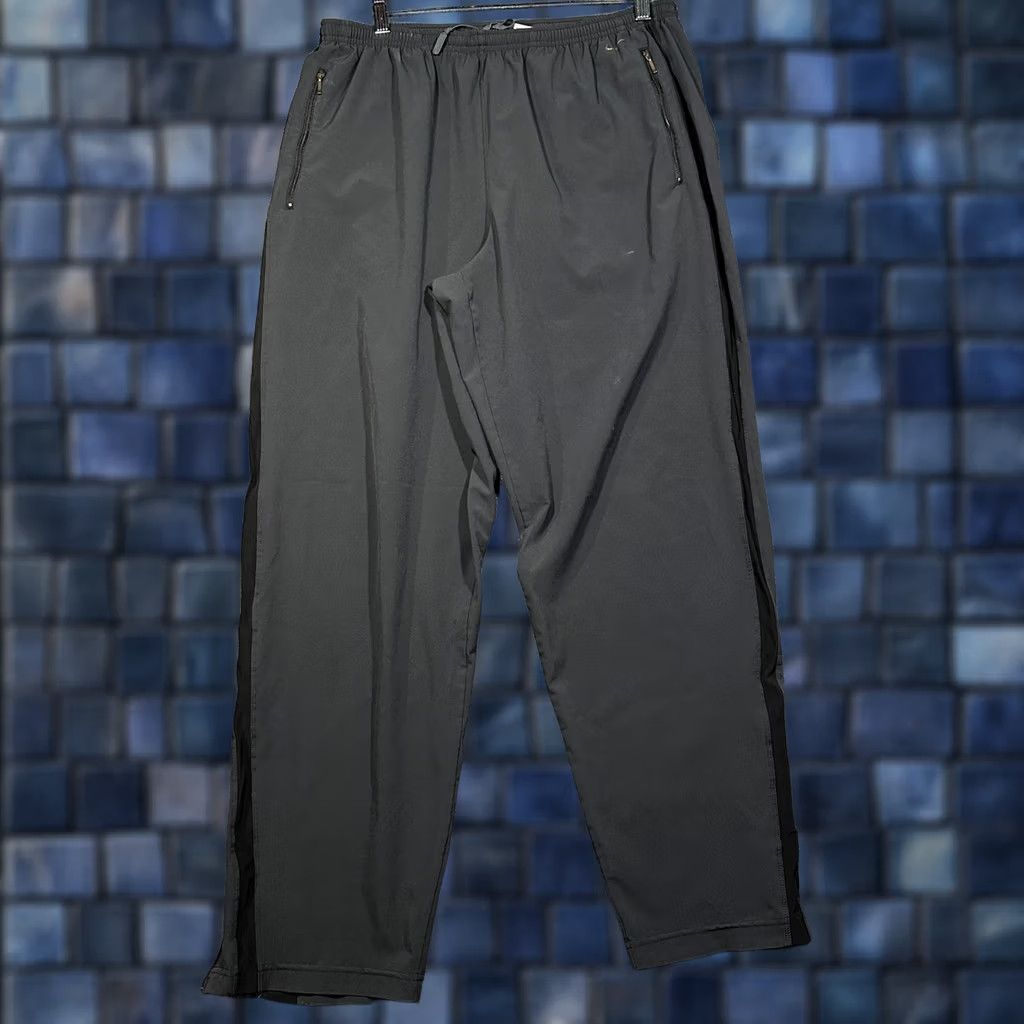 Nike Nike Track Pants Womens Large Black Zip Pockets Zip Ankles Elastic Tie Waist Regular Fit 30 Inseam Pockets Logo Fashion Activewear Shoes? Size 36" / US 14 / IT 50 - 1 Thumbnail