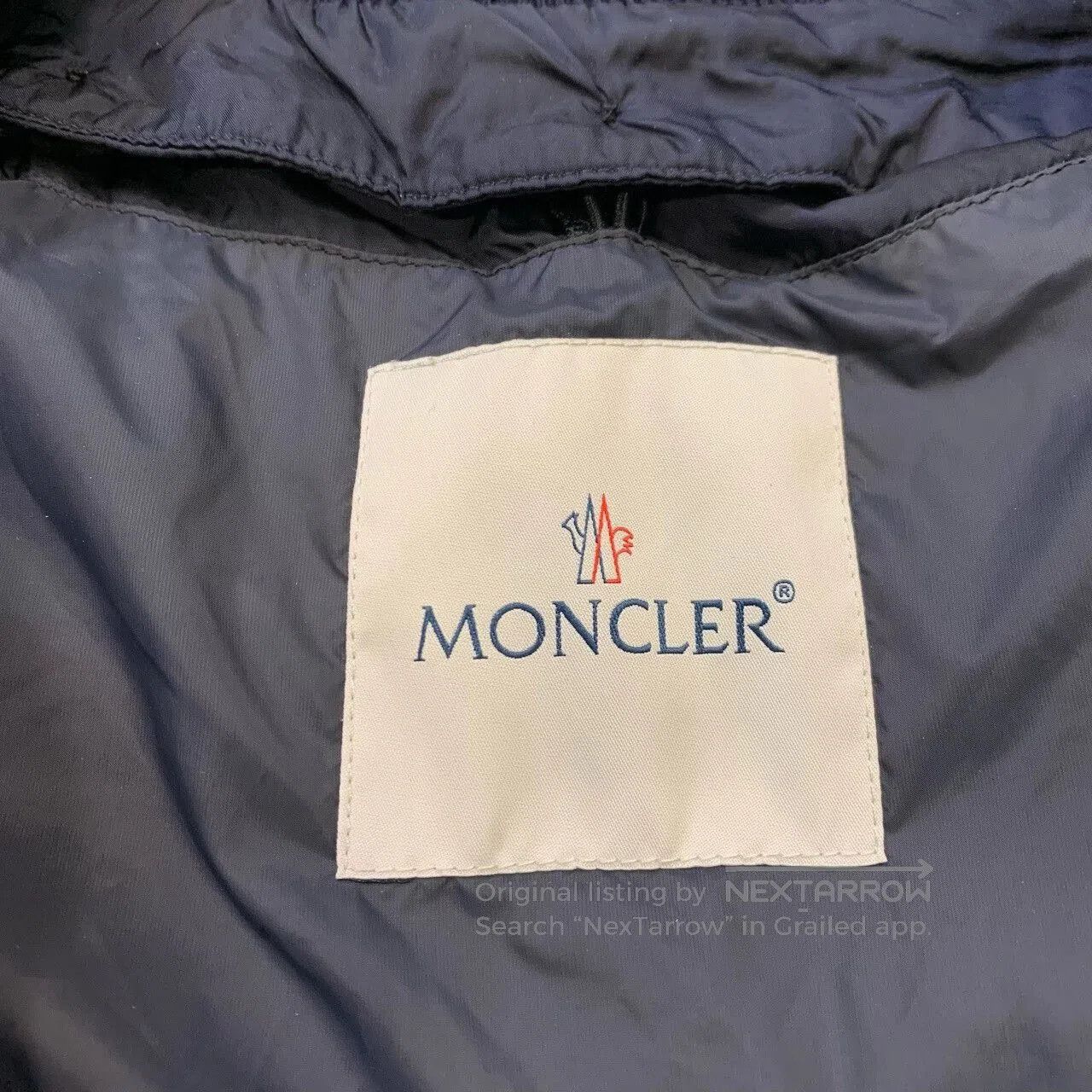 moncler deep blue down jacket with detachable design.