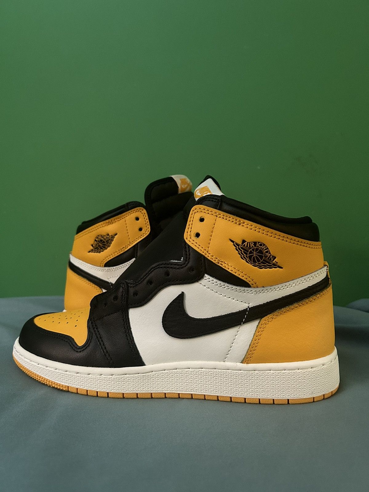 image of Nike Air Jordan 1 High Taxi 2022 Shoes in Orange, Men's (Size 7)