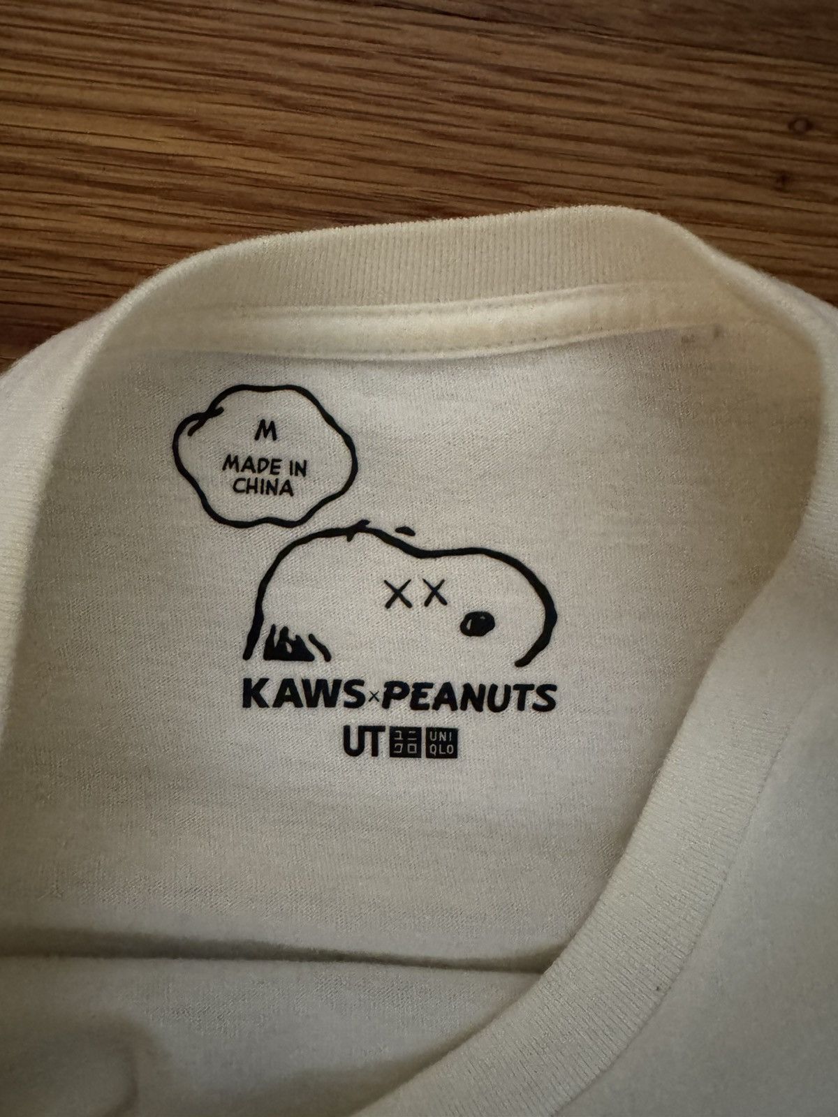 Kaws × Uniqlo Uniqlo Kaws Snoopy T-shirt White - size Medium Size US M / EU 48-50 / 2 - 3 Thumbnail