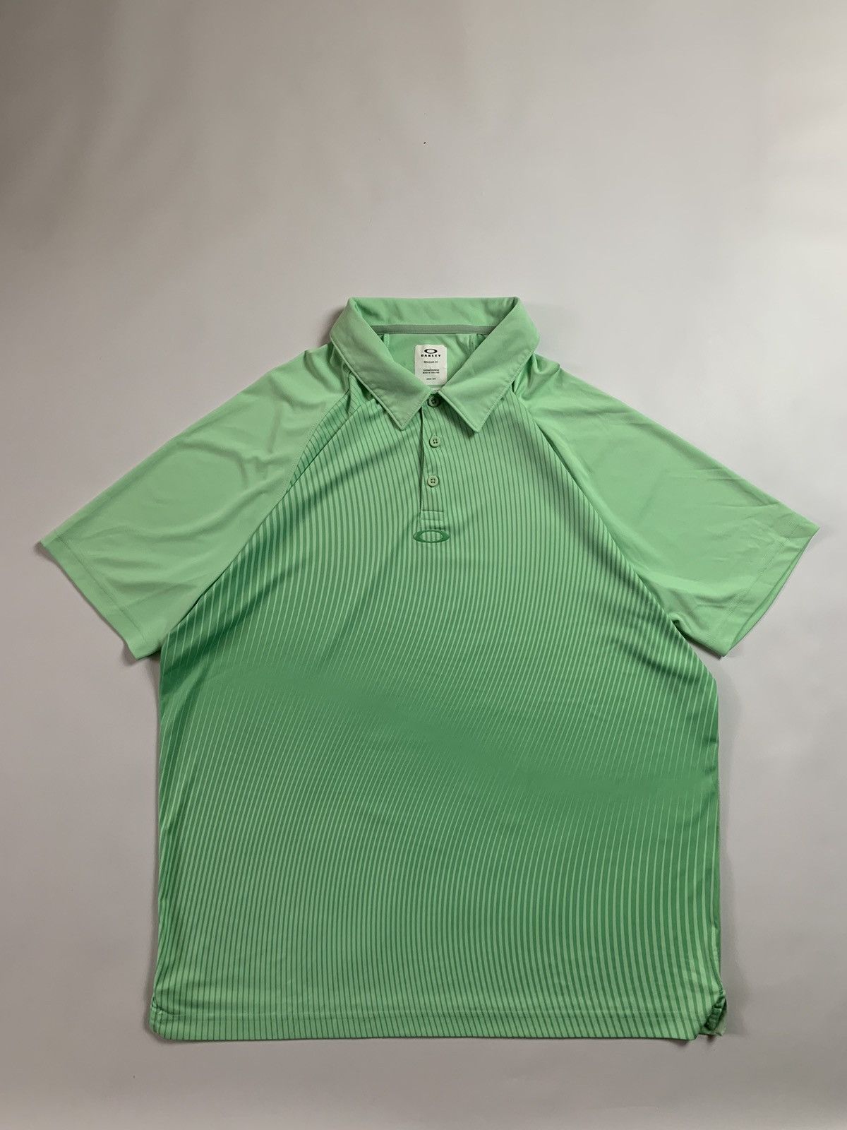 oakley-oakley-regular-fit-polo-t-shirt-center-logo-grailed