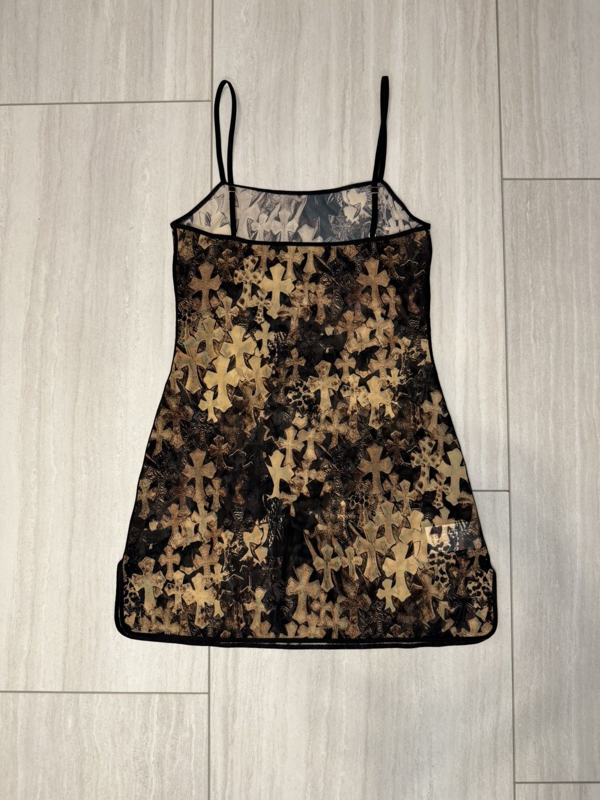 chrome hearts dress METALLIC DENIM MINI forward. The Elusive Family Behind Chrome
