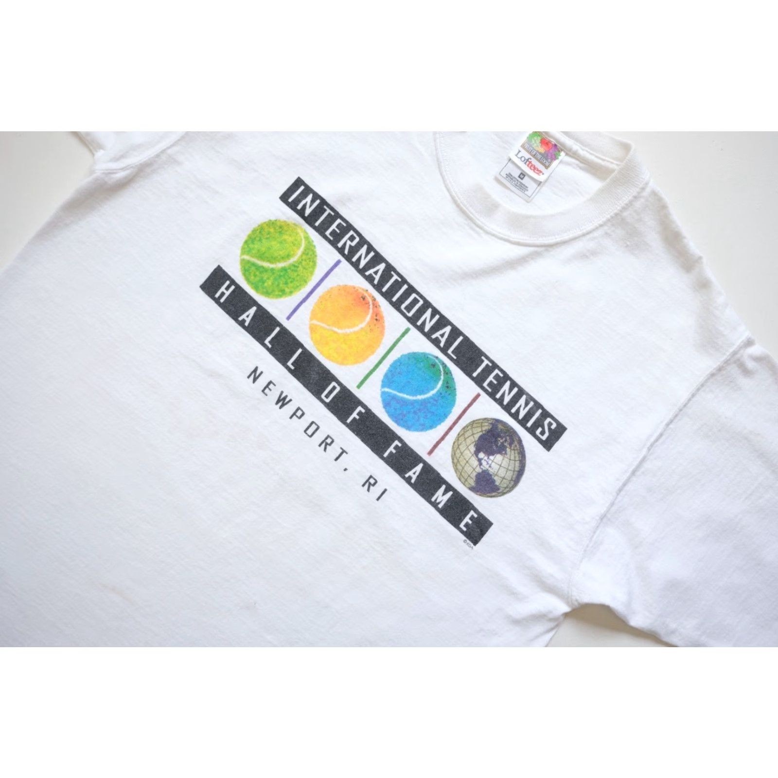 Fruit Of The Loom VINTAGE Fruit of the Loom VTG Y2K 90s RETRO INTERNATIONAL TENNIS HALL OF FAME T SHIRT MD Mens Short Sleeve Crew Neck White Cotton 90s Sports Size US M / EU 48-50 / 2 - 4 Thumbnail