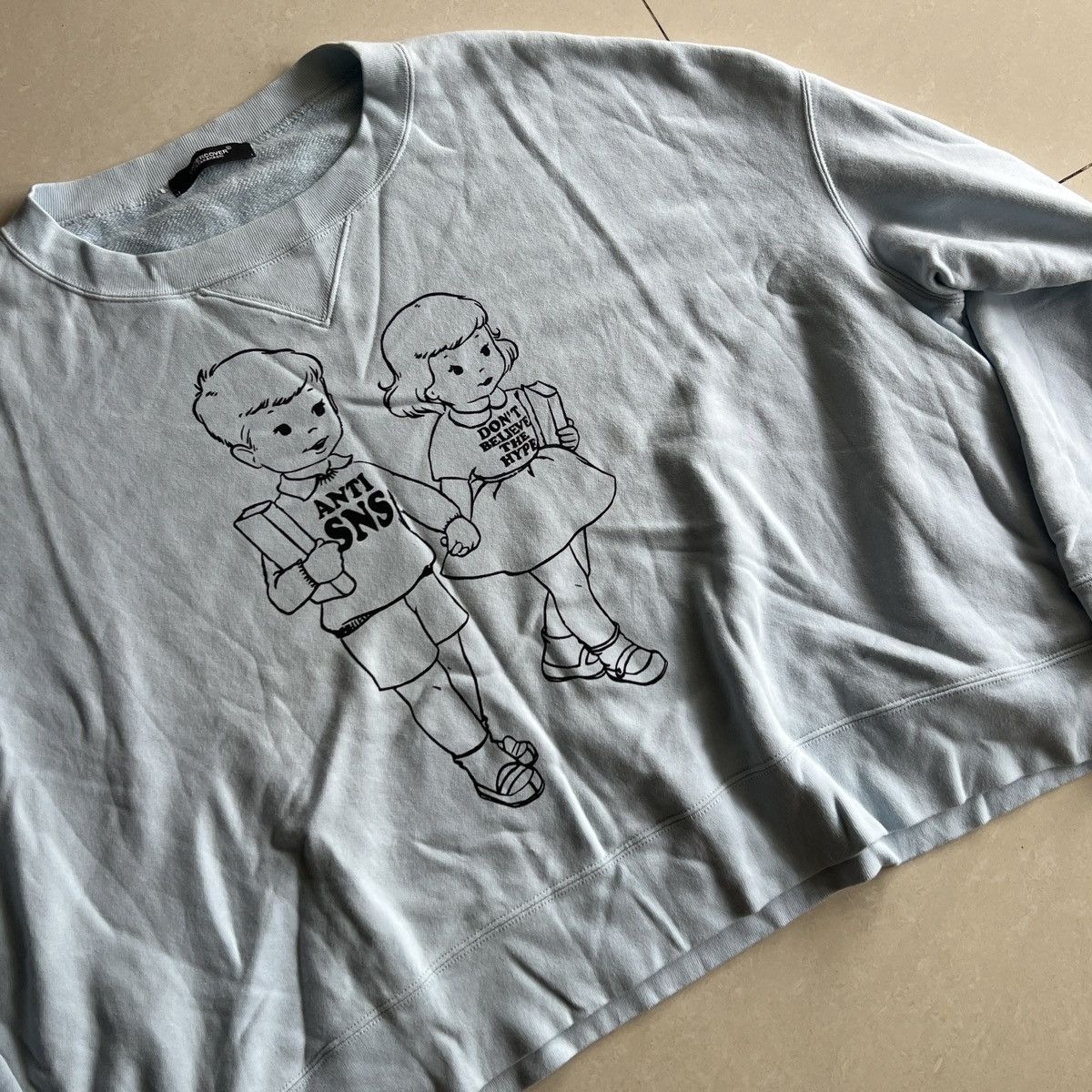 AW18 Undercover anti sns cropped sweater