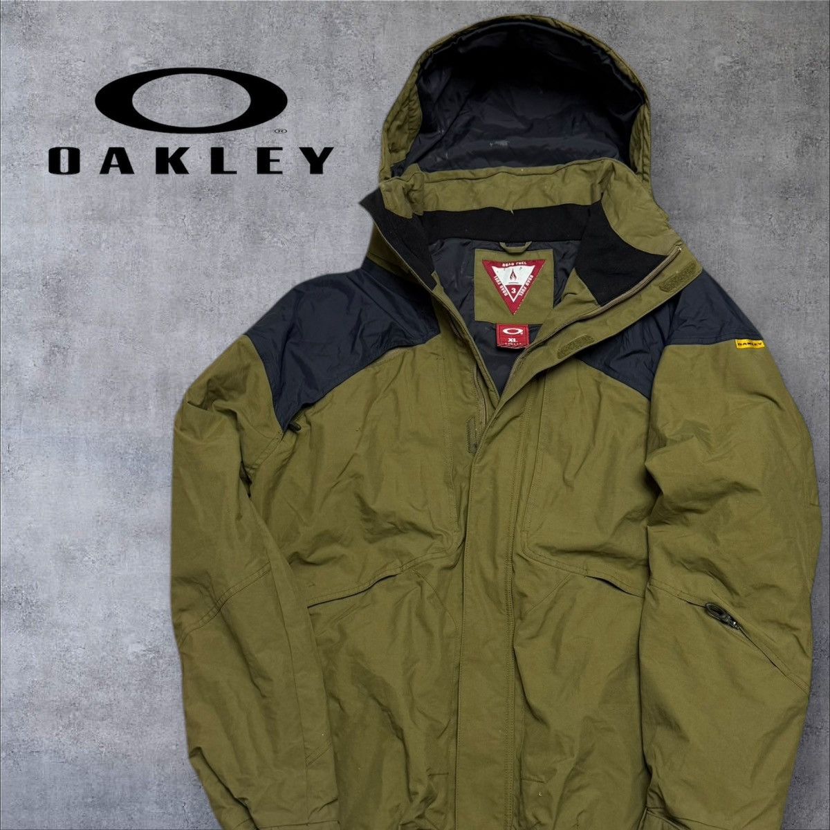 Oakley × Vintage Vintage khaki oakley jacket size XL snowboard Size US XL / EU 56 / 4 - 1 Thumbnail