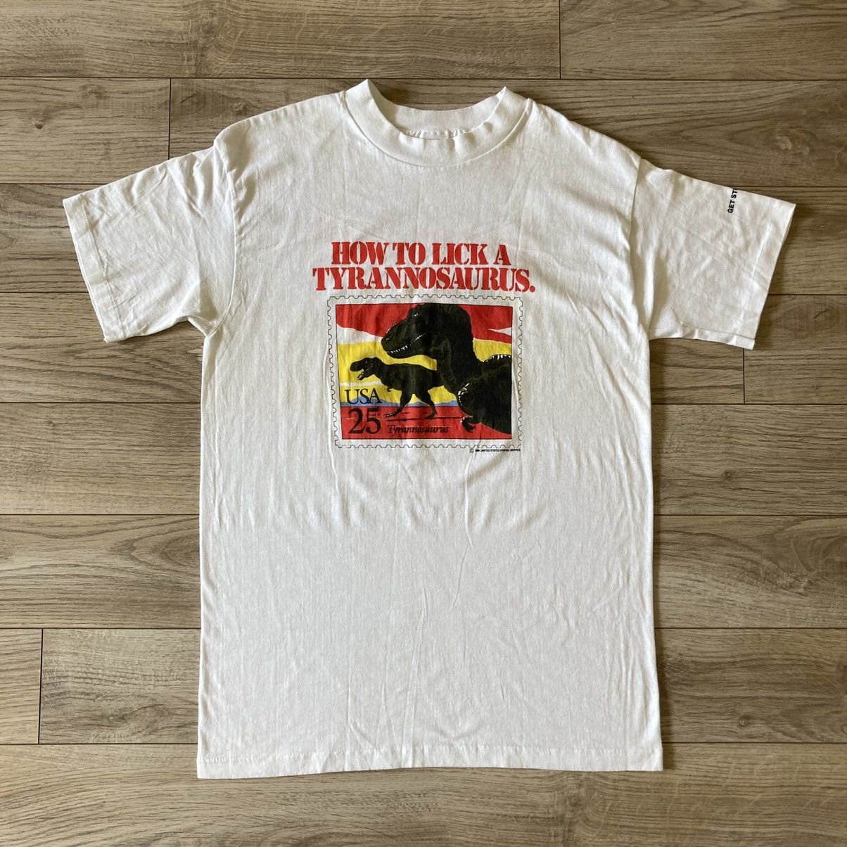 Vintage 1980s How to Lick a Tyrannosaurus Rex USPS stamp promo tee Size US L / EU 52-54 / 3 - 1 Thumbnail
