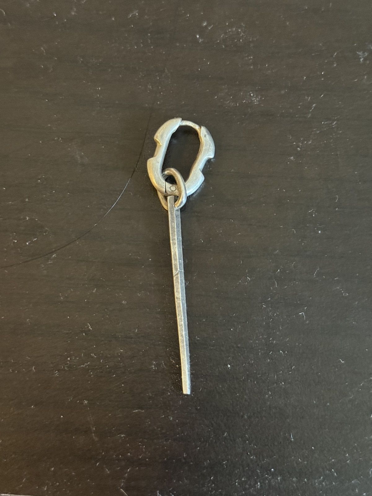 Parts of four dangle 925 earring