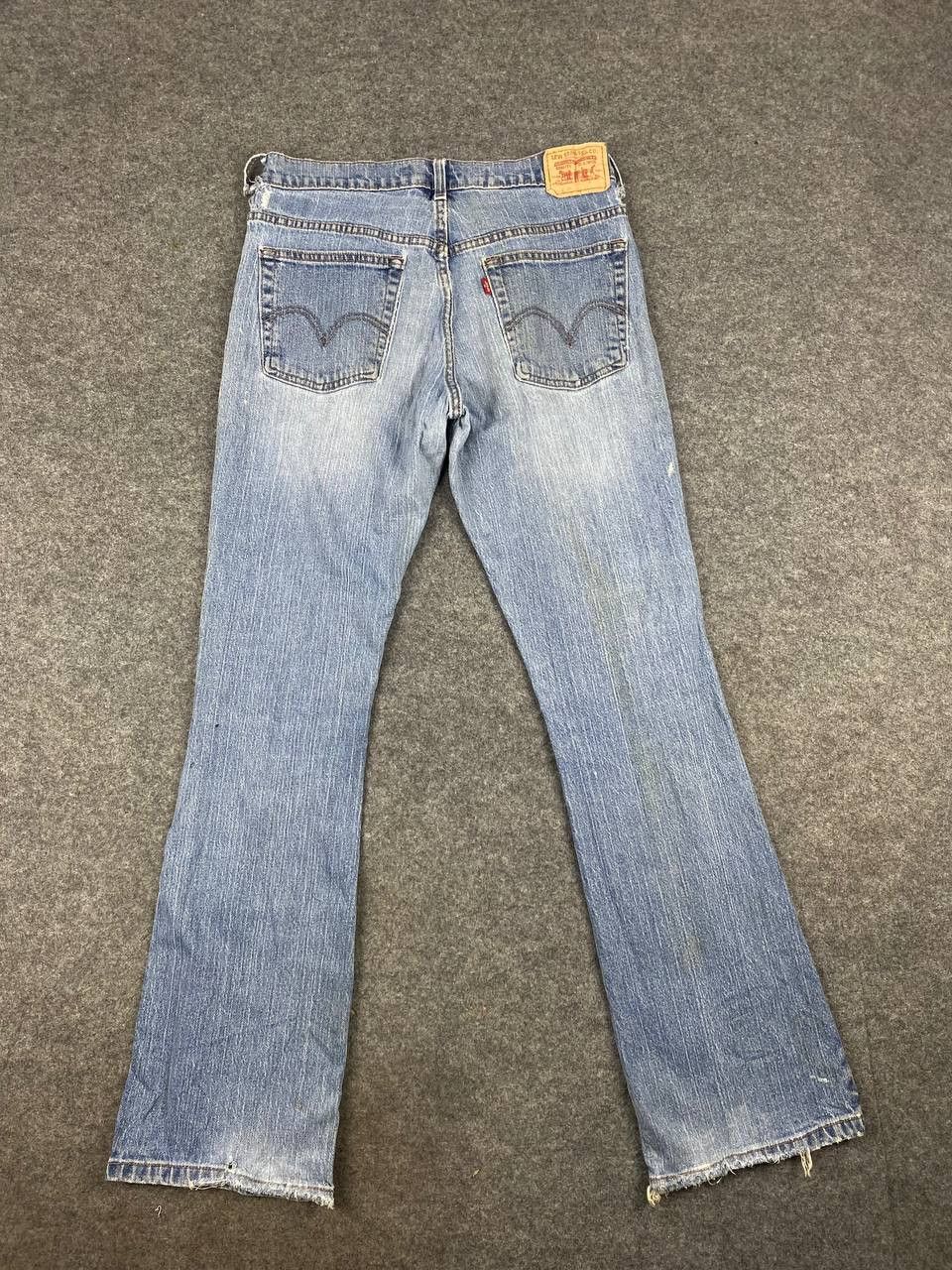image of Vintage Levis 515 Bootcut Flare Distressed Denim in Light Blue, Women's (Size 33)