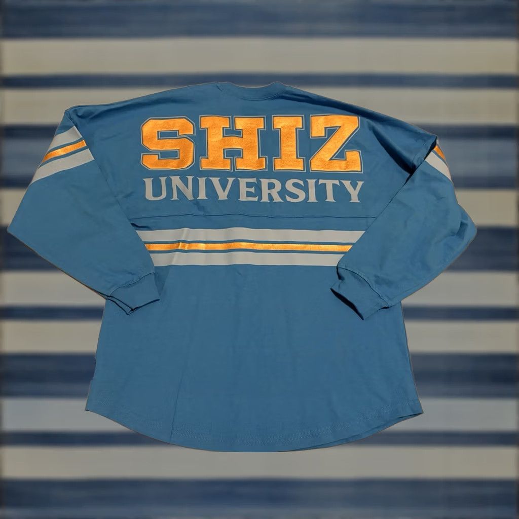 Vintage Wicked Universal Studios Spirit Jersey University Blue Medium NWT Women M Long Sleeve 100% Cotton Shiz University Shirt Brand New Size M / US 6-8 / IT 42-44 - 1 Thumbnail
