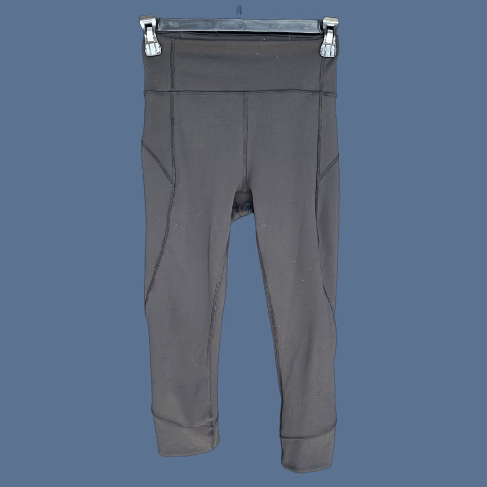 Lululemon Lululemon In Movement Crop Everlux 19.5" Black Leggings Size 4 W6AHJ Size 27" / US 4 / IT 40 - 1 Thumbnail