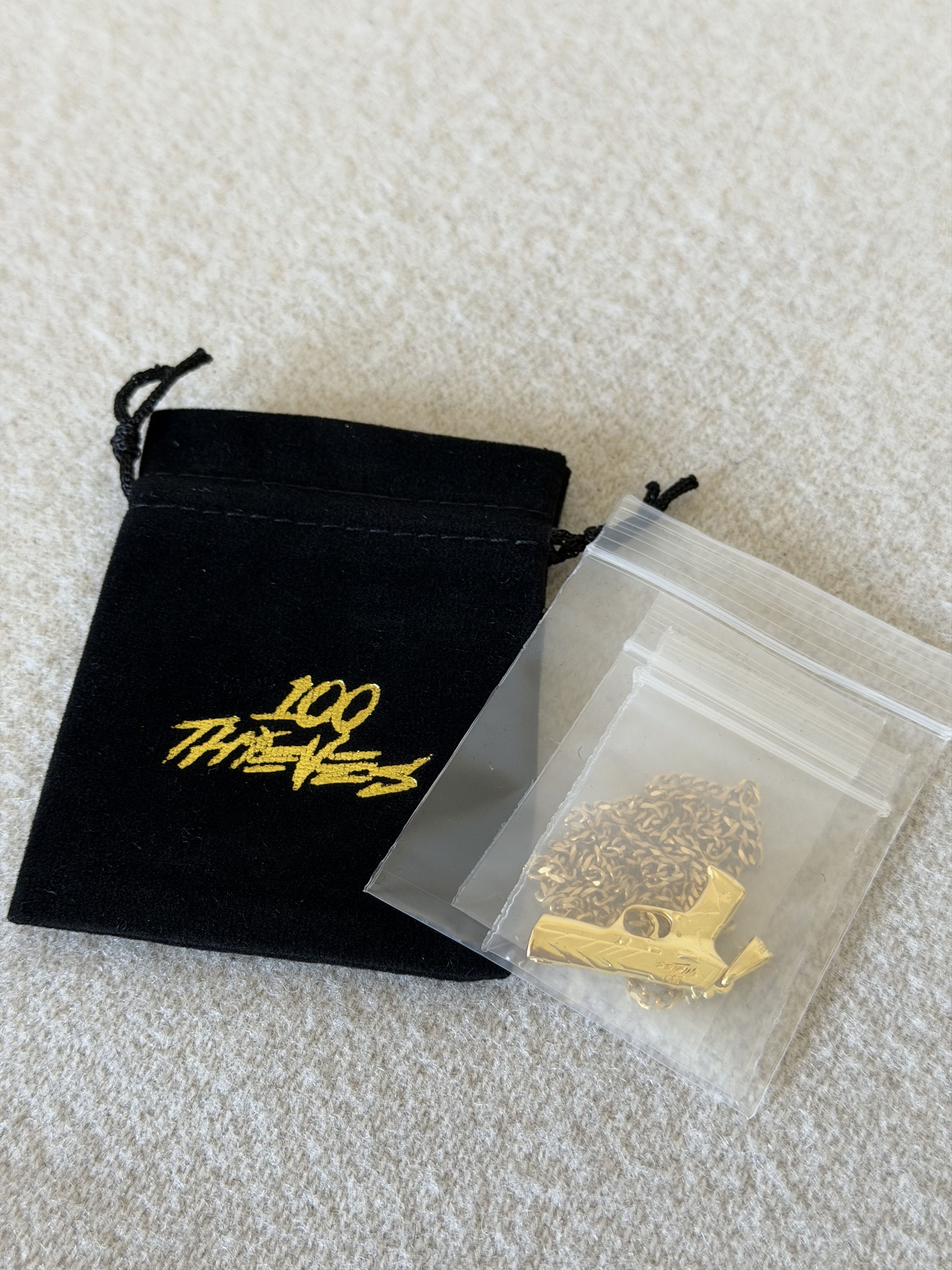 100 Thieves 100 Thieves Valorant Pistol Premium Necklace in Gold Size ONE SIZE - 1 Thumbnail