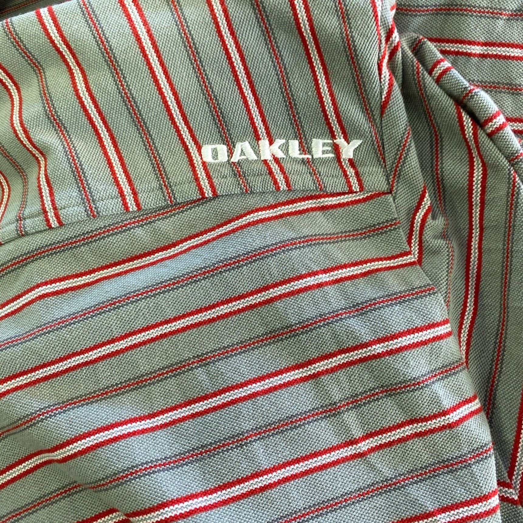Oakley VINTAGE Oakley Polo Shirt Center Logo Y2K Drill 2XL Red Grey Mens Polo Shirt, Logo, 90s, All Seasons, Golf, Skateboarding, Walking Size US XXL / EU 58 / 5 - 5 Thumbnail