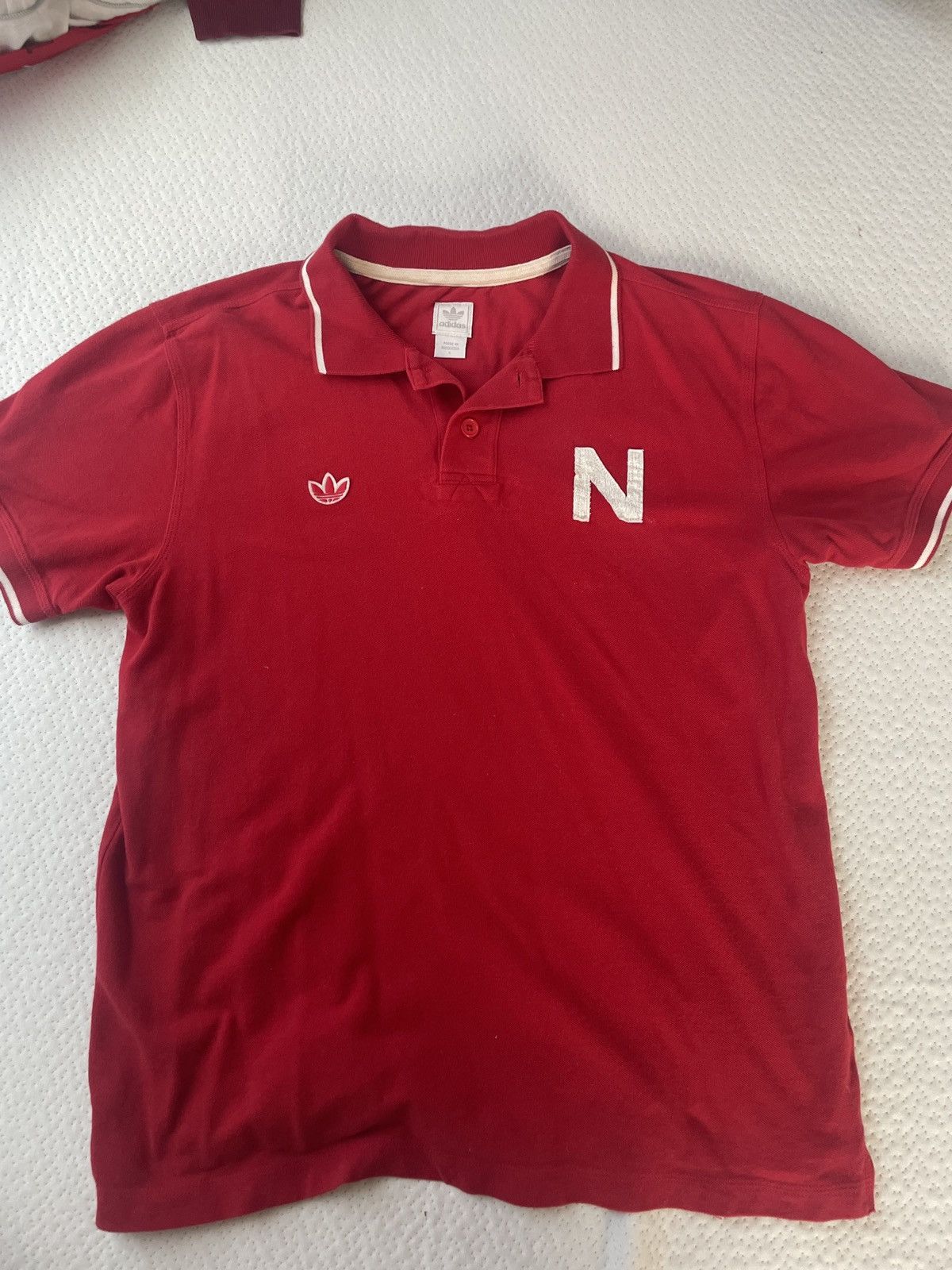 image of Adidas X Nebraska Lincoln Polo in Red, Men's (Size Large)