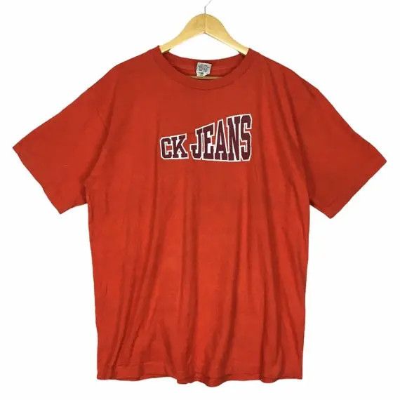 Vtg CALVIN KLEIN CK Jeans Logo Orange Tee Shirt New York