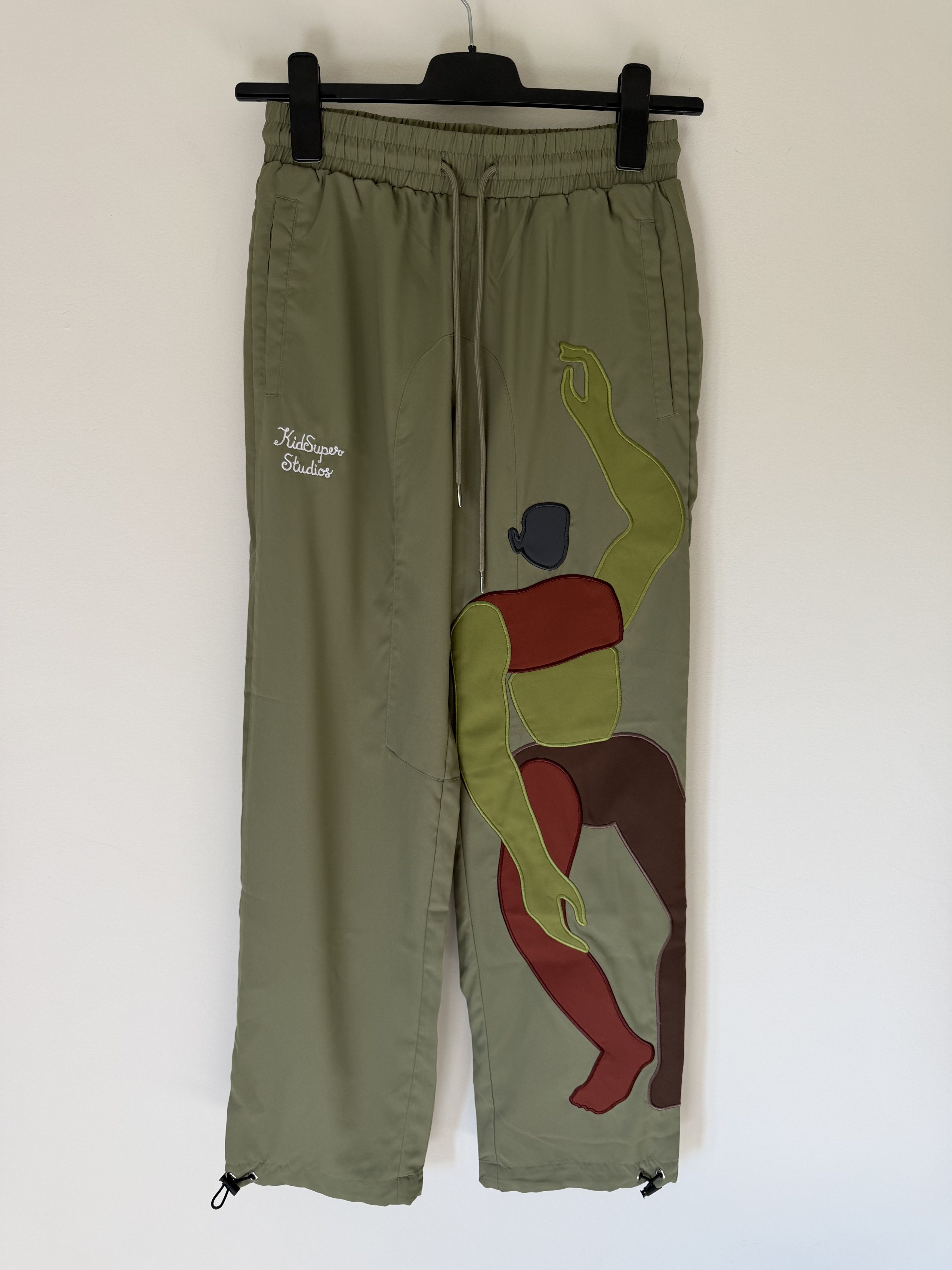 KidSuper KidSuper Studios Falling Guy Track Pants in Green Size US 30 / EU 46 - 1 Thumbnail