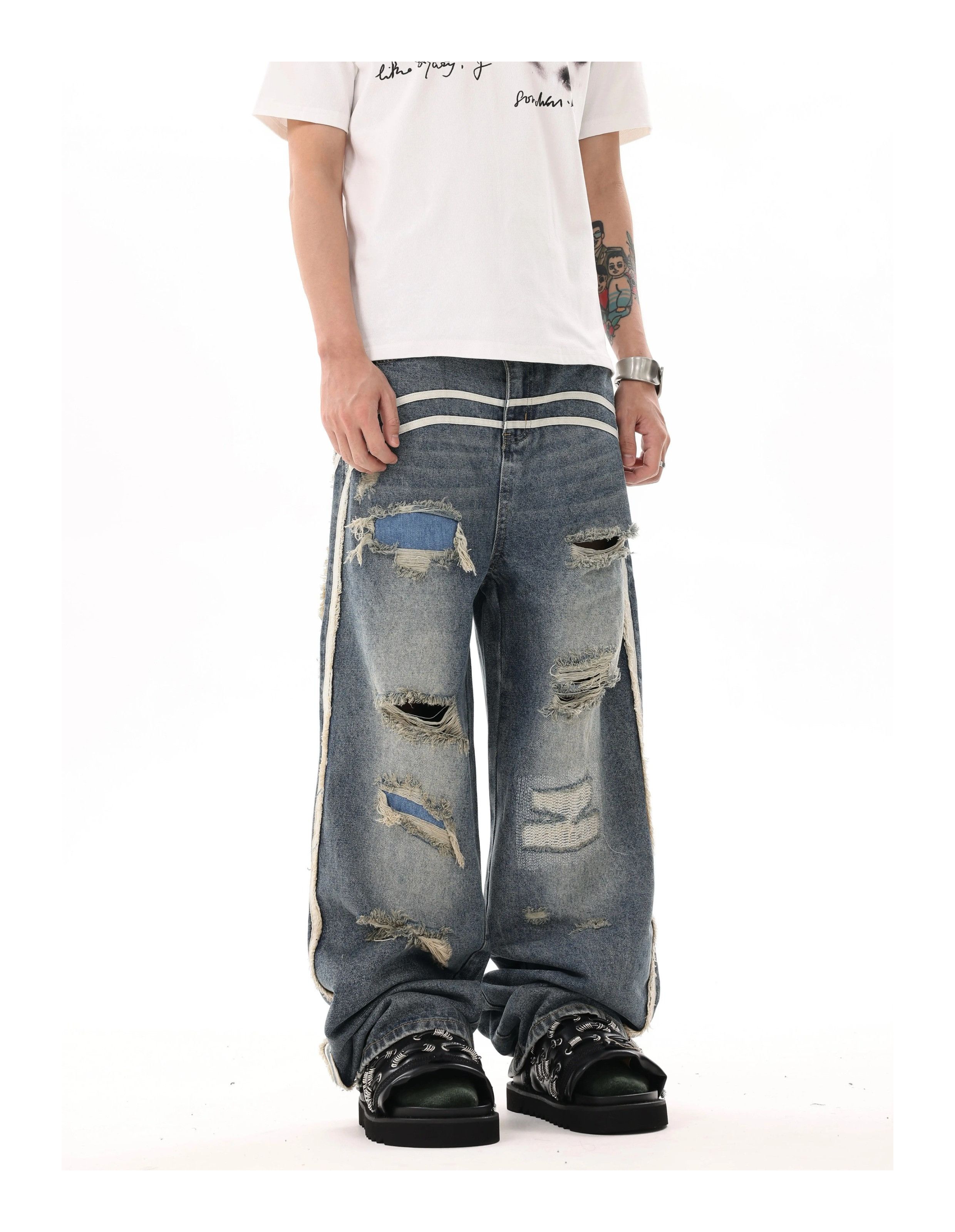 Distressed track denim jeans clearance