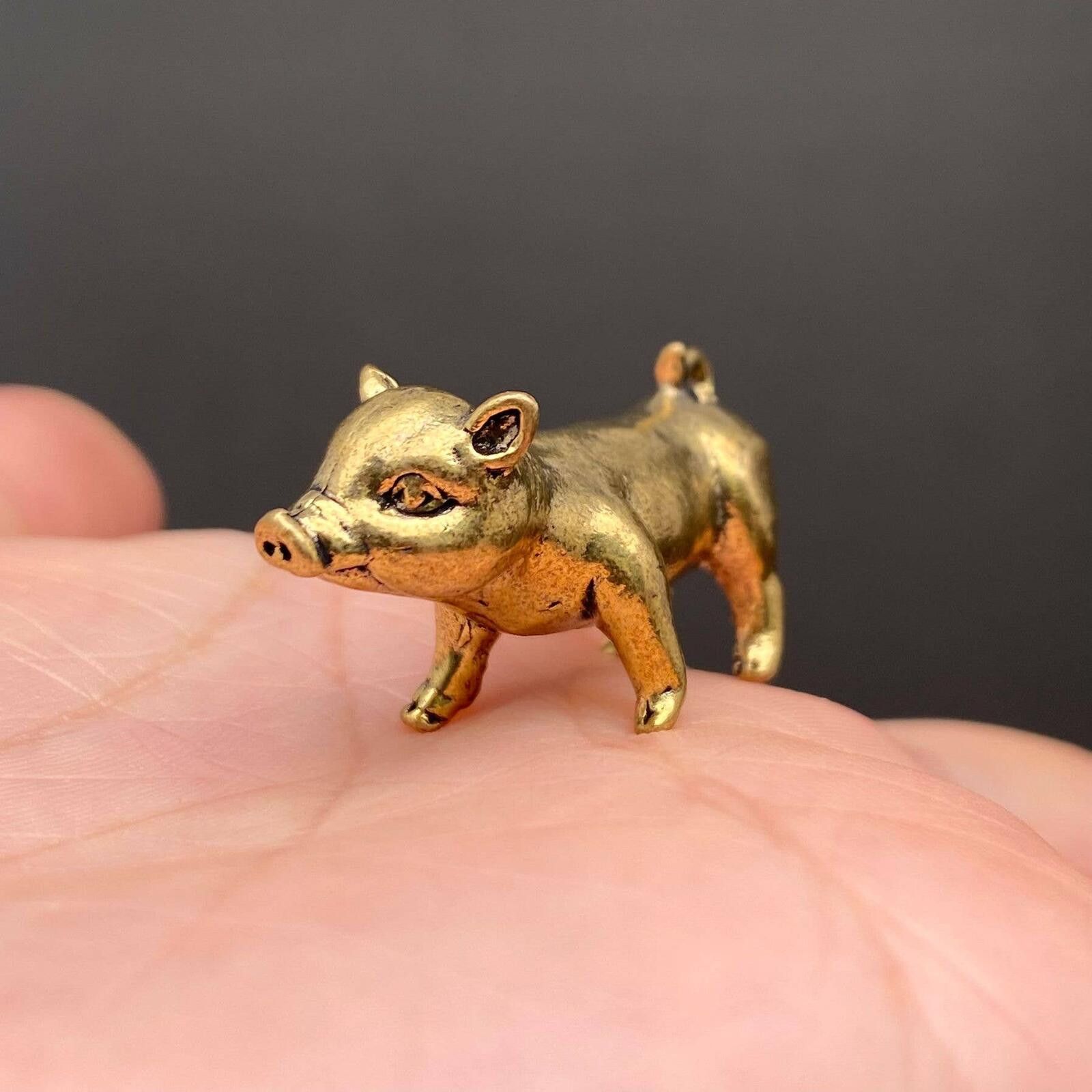 The Unbranded Brand Miniature Golden Pig Figurine Collectible Size ONE SIZE - 1 Thumbnail