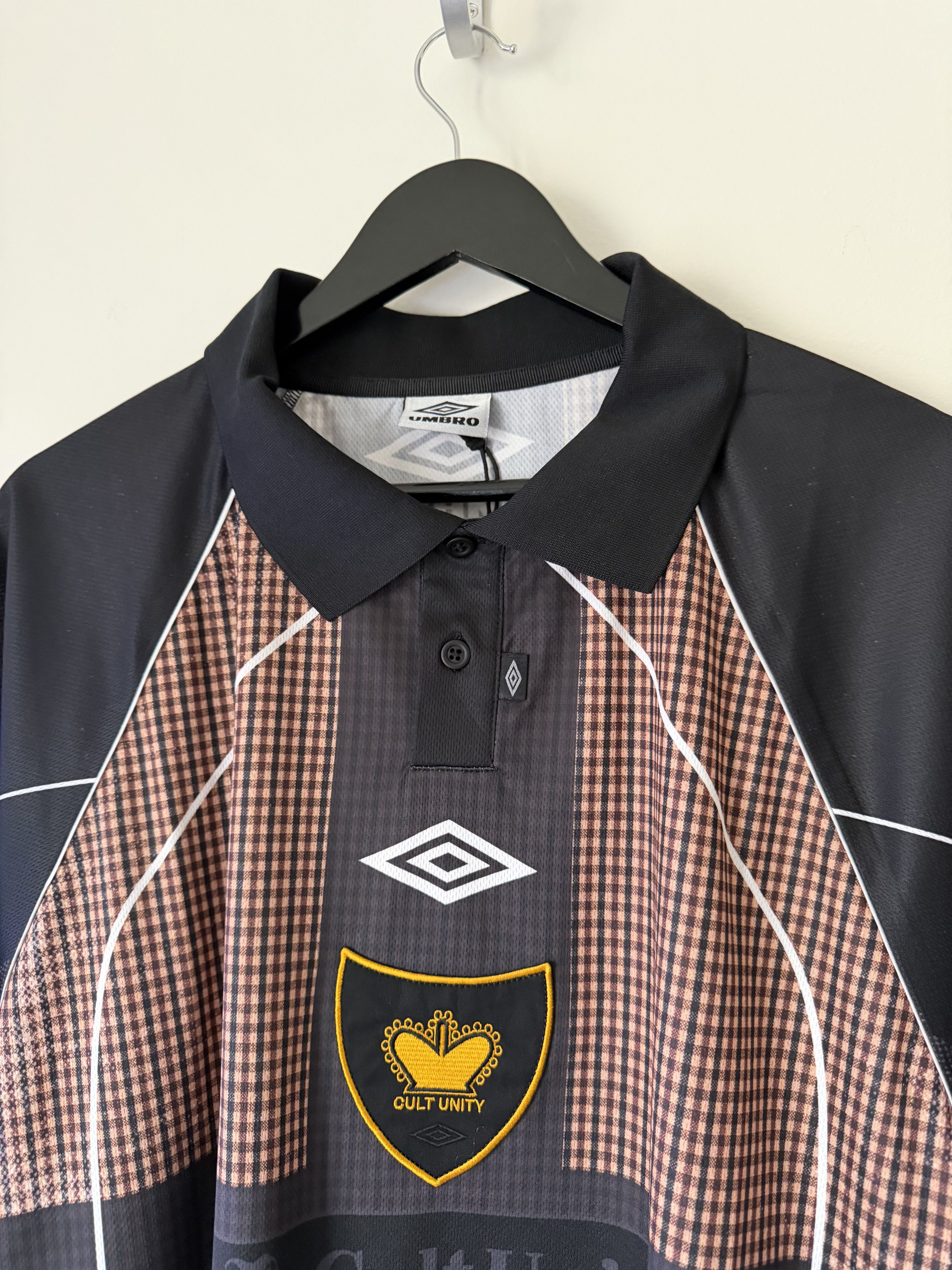Umbro Penalty Culture Cult Unity Check Polo in Beige