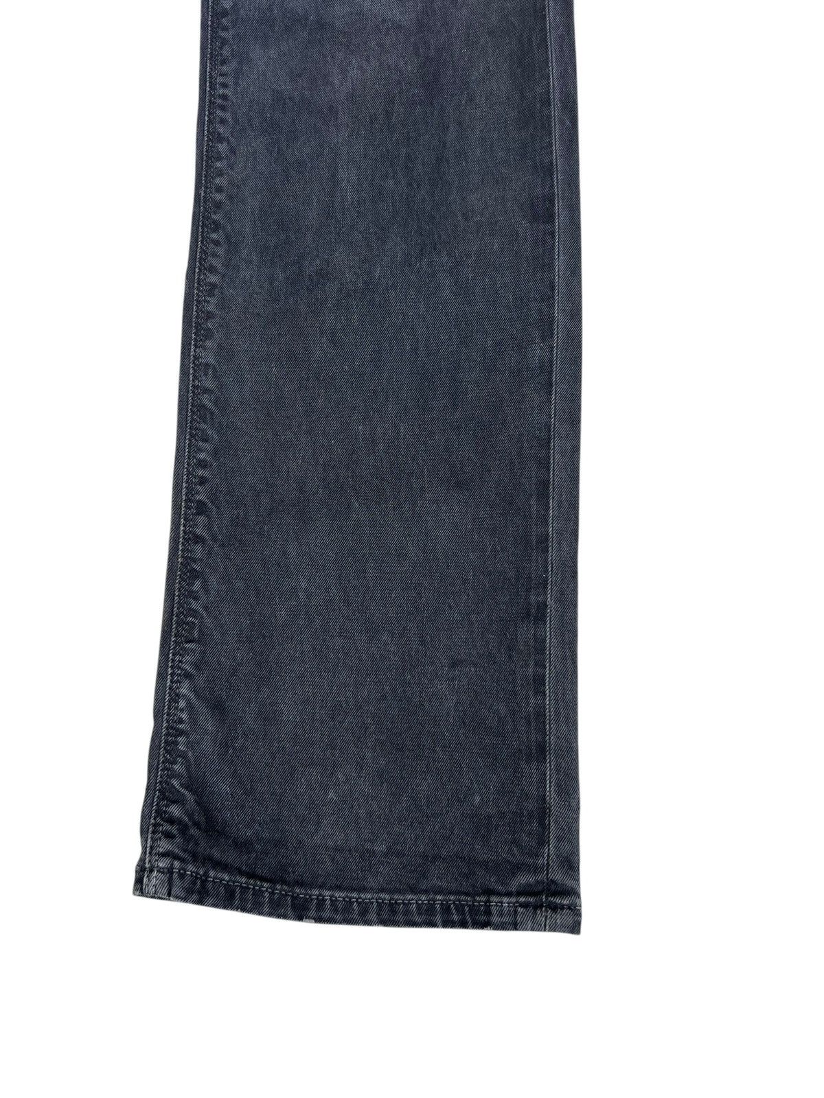 Distressed Prada Waxed Jeans