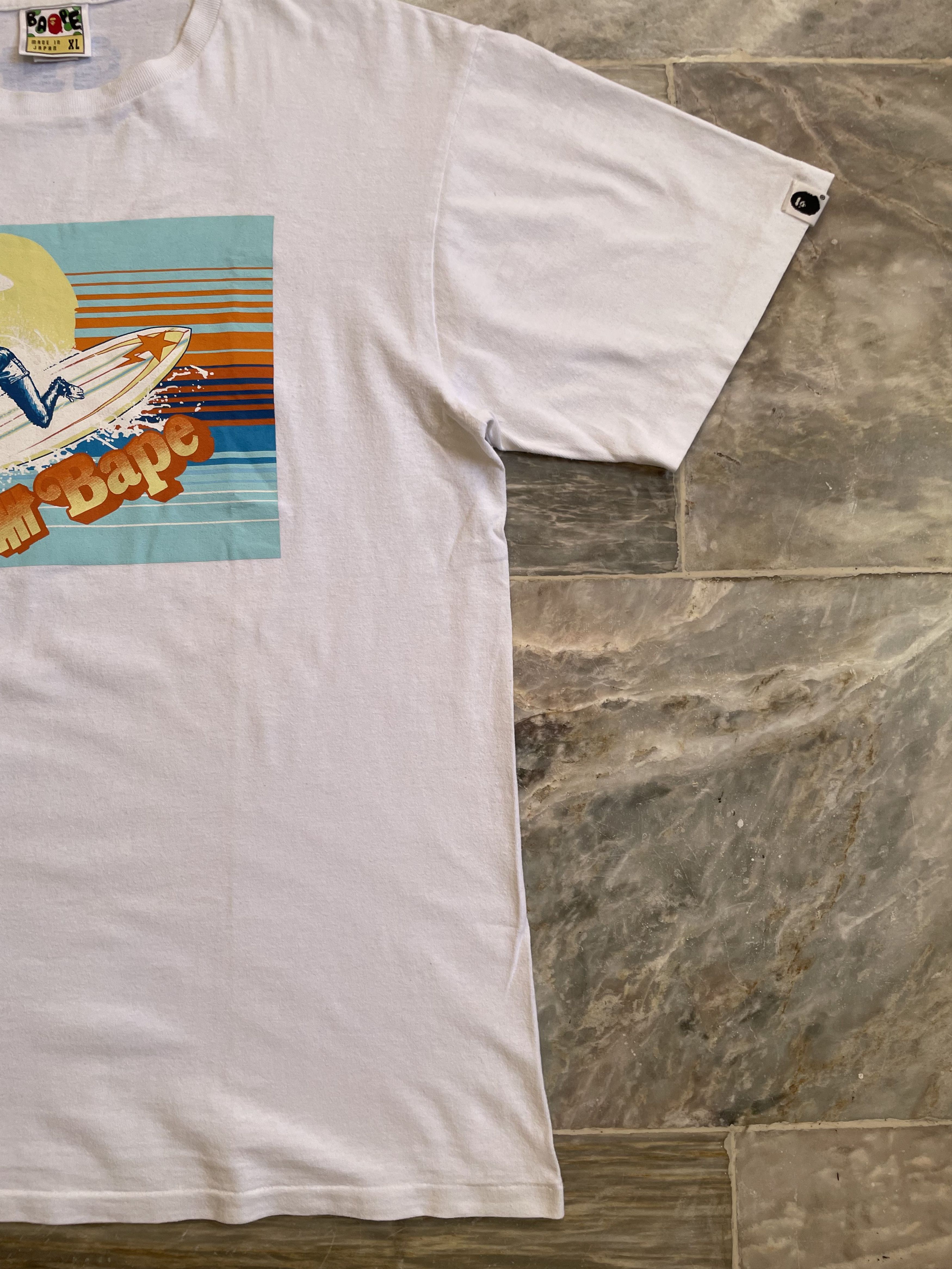 Bape × Nigo × Undefeated Bape x Undefeated Surfing Ape Tee Size US L / EU 52-54 / 3 - 4 Thumbnail
