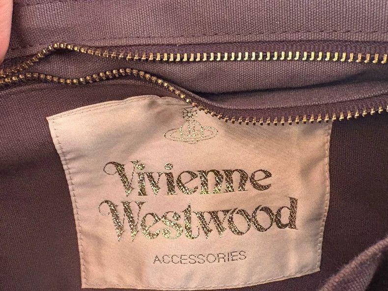 Vivienne Westwood Vivienne Westwood size os Purple snake skin Saturn logo cro Size ONE SIZE - 8 Thumbnail