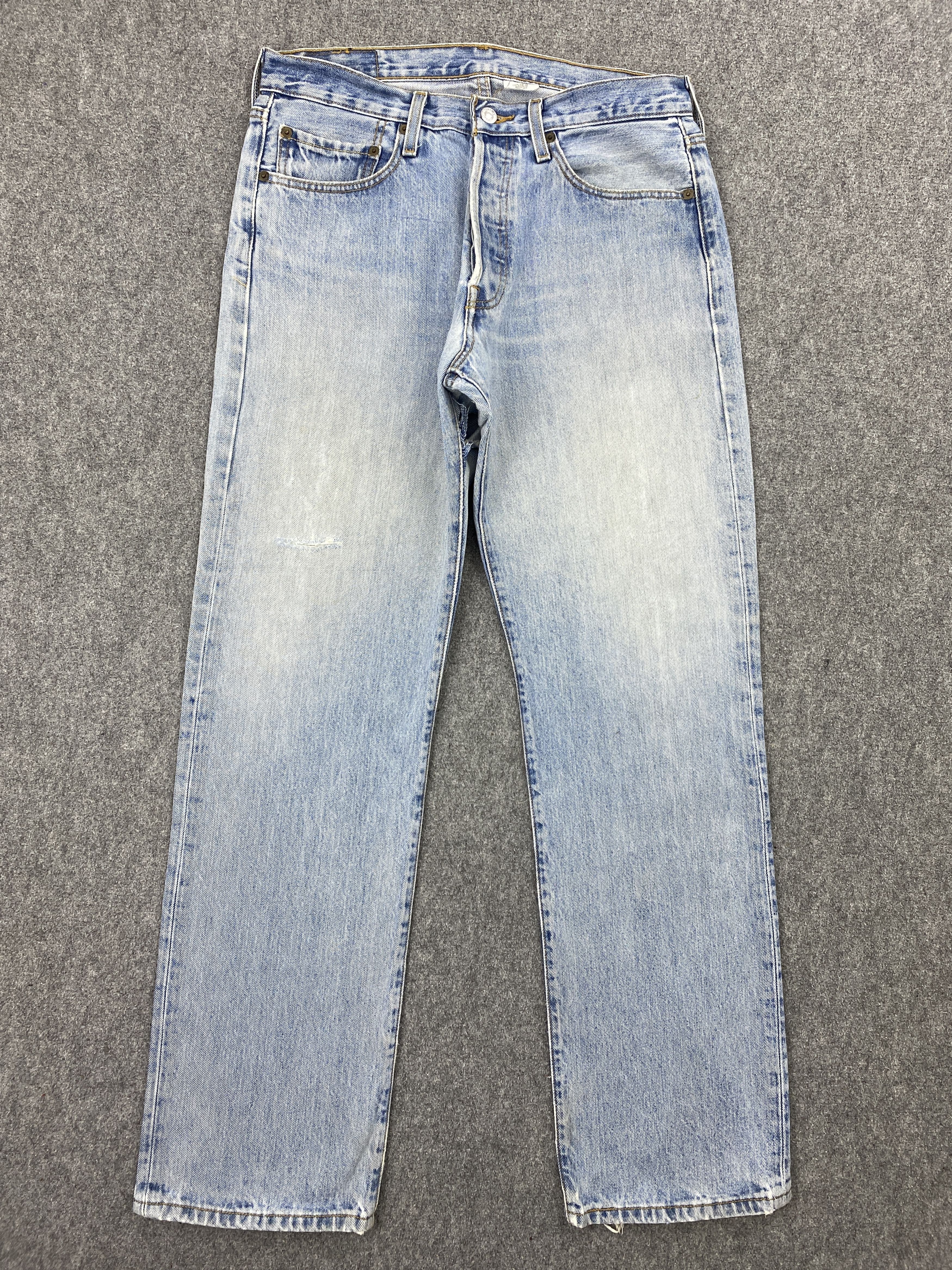 Vintage Levi's 501 Light Washed Distressed Jeans DP2326