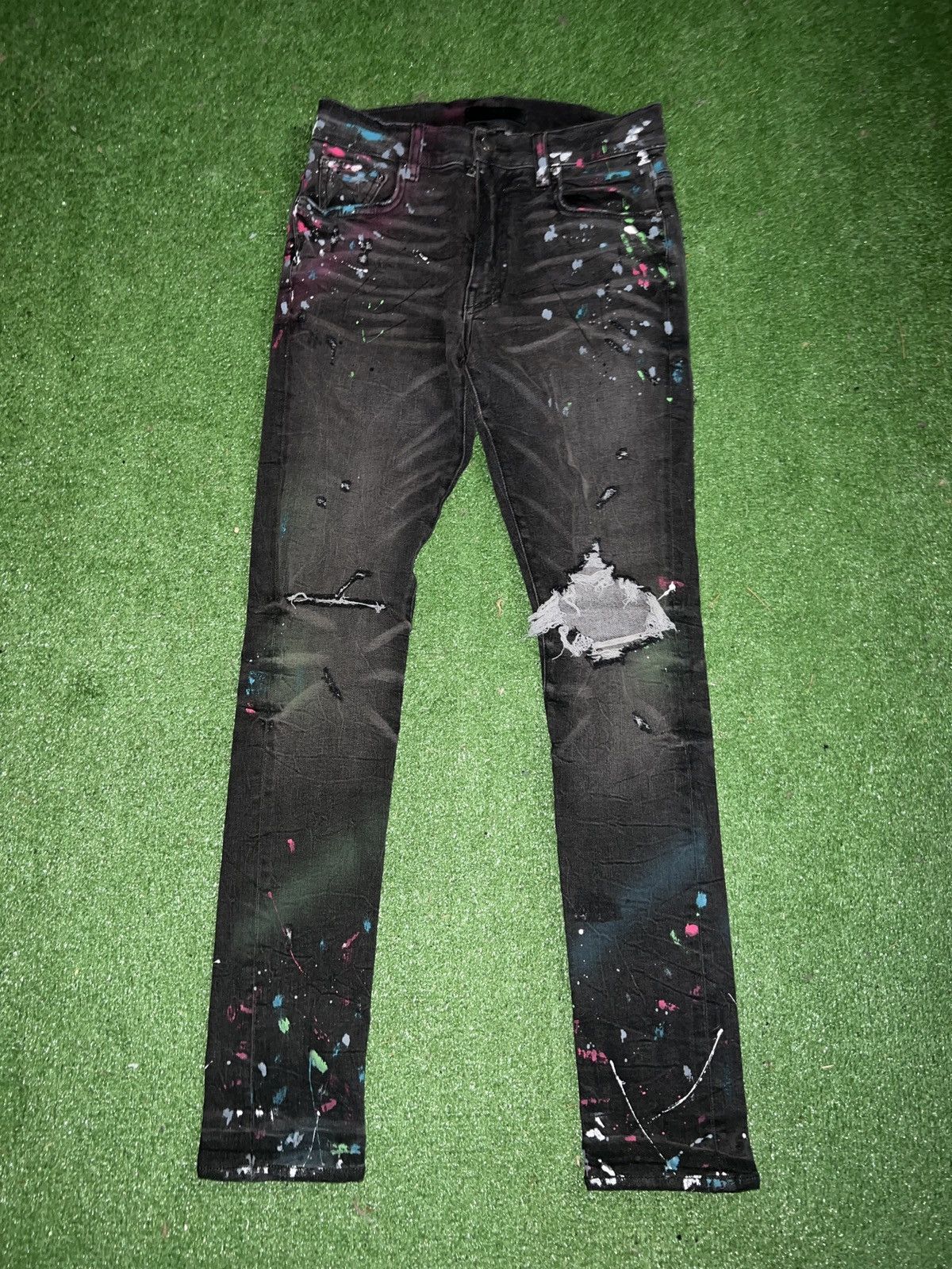 Amiri Amiri black paint splatter Jeans | Grailed