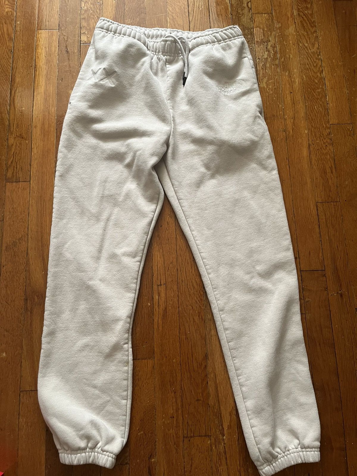 The North Face Kaws x North face sweat pants M | Grailed