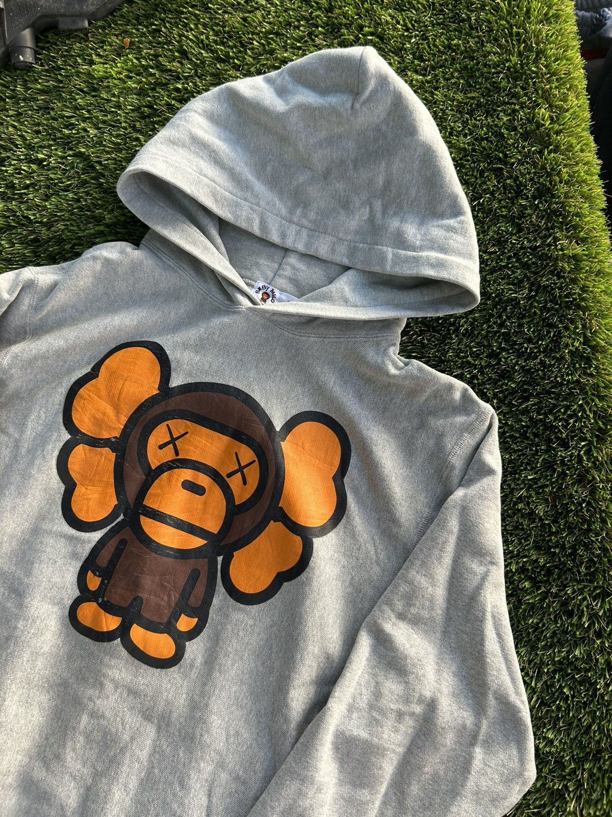 Bape 2006 Pink Bape Baby Milo x Kaws Animal Kingdom Hoodie | Grailed