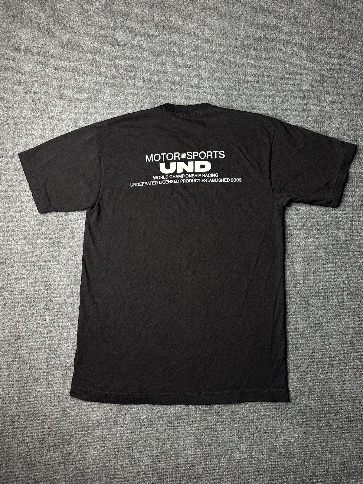 Undefeated Mens T-Shirt Undefeated Motorsports Black White USA, Size M Size US M / EU 48-50 / 2 - 1 Thumbnail