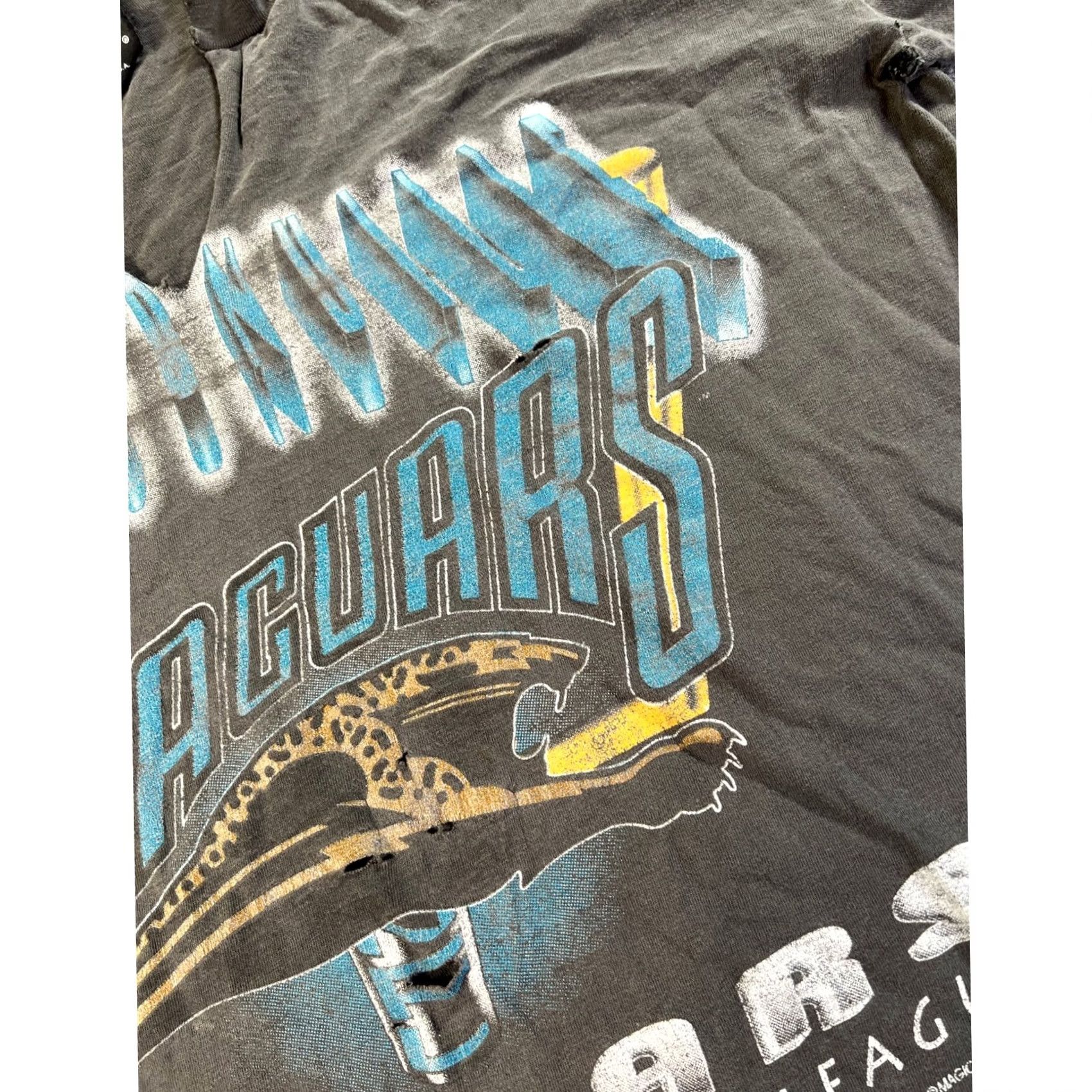 NFL VINTAGE Magic Johnson Jaguars T Shirt Mens L Black 1993 NFL Distressed Graphic Tee Grunge Sportswear Football 90s Mens Size US L / EU 52-54 / 3 - 5 Thumbnail
