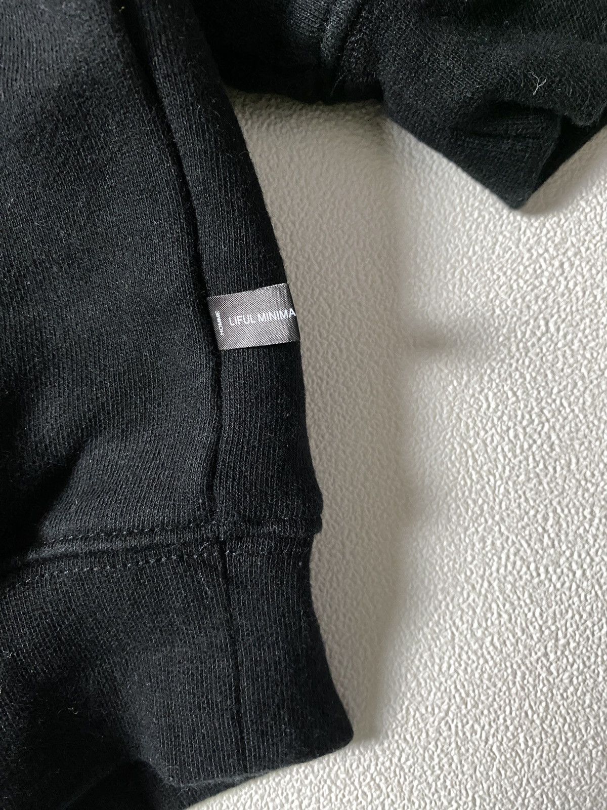 LIFUL MINIMAL GARMENTS Rifle Crewneck MINI OVAL LOGO SWEATSHIT-BLACK Size US L / EU 52-54 / 3 - 4 Thumbnail