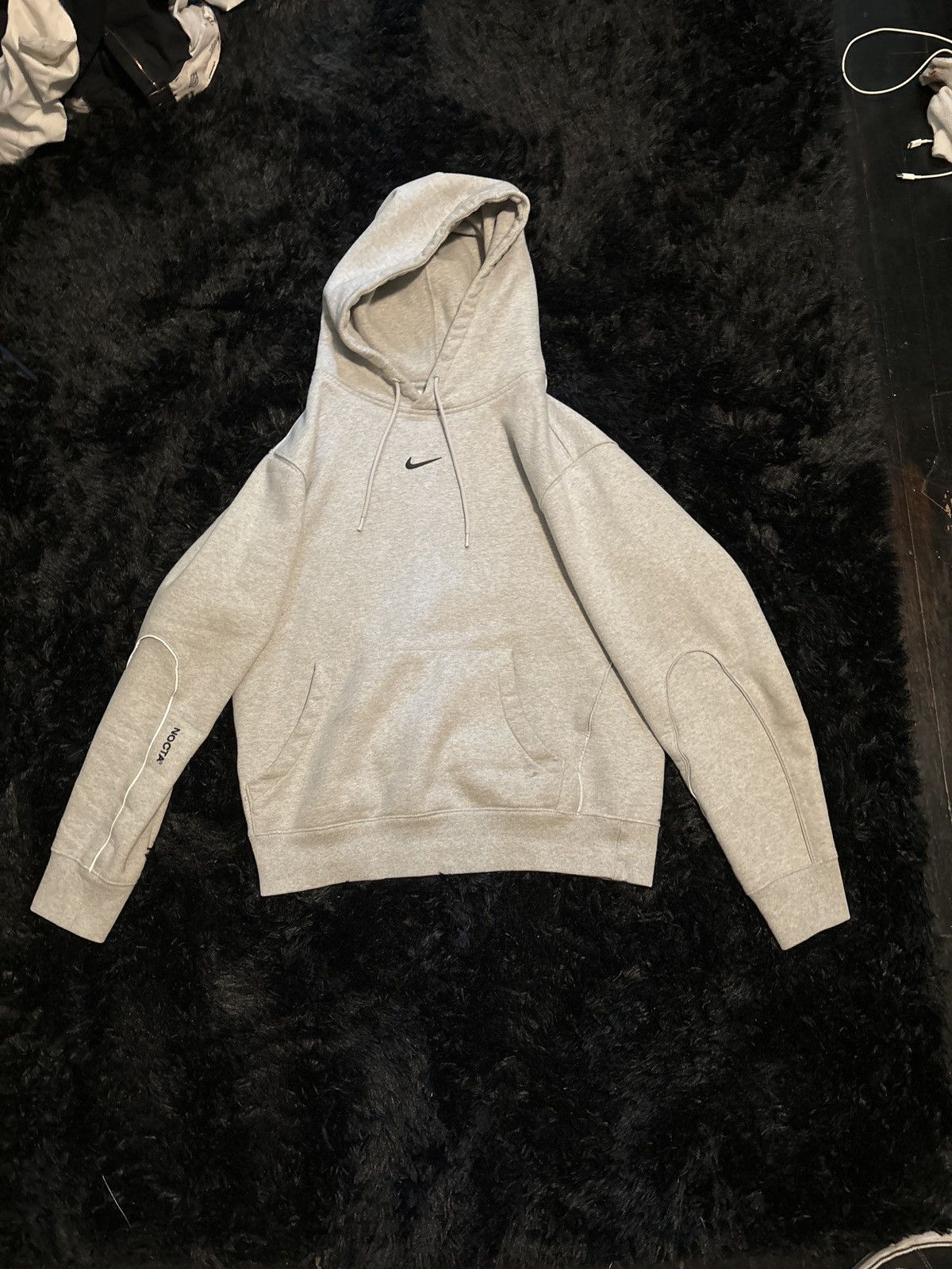 image of Drake Nike Nocta Cardinal Stock Hoodie in Grey, Men's (Size Medium)