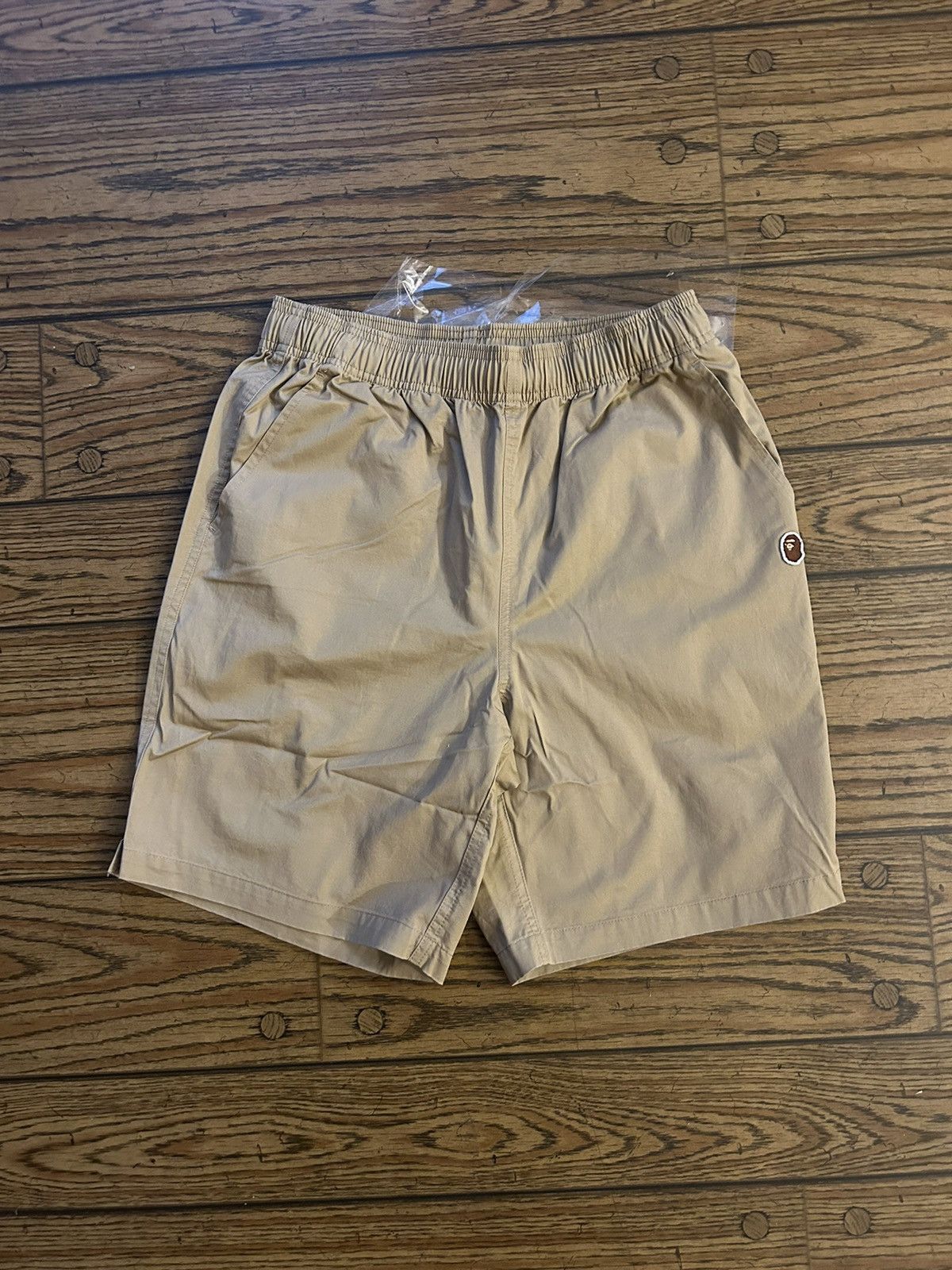 image of Bape Beige Ape Head Beach Shorts in Brown, Men's (Size 38)