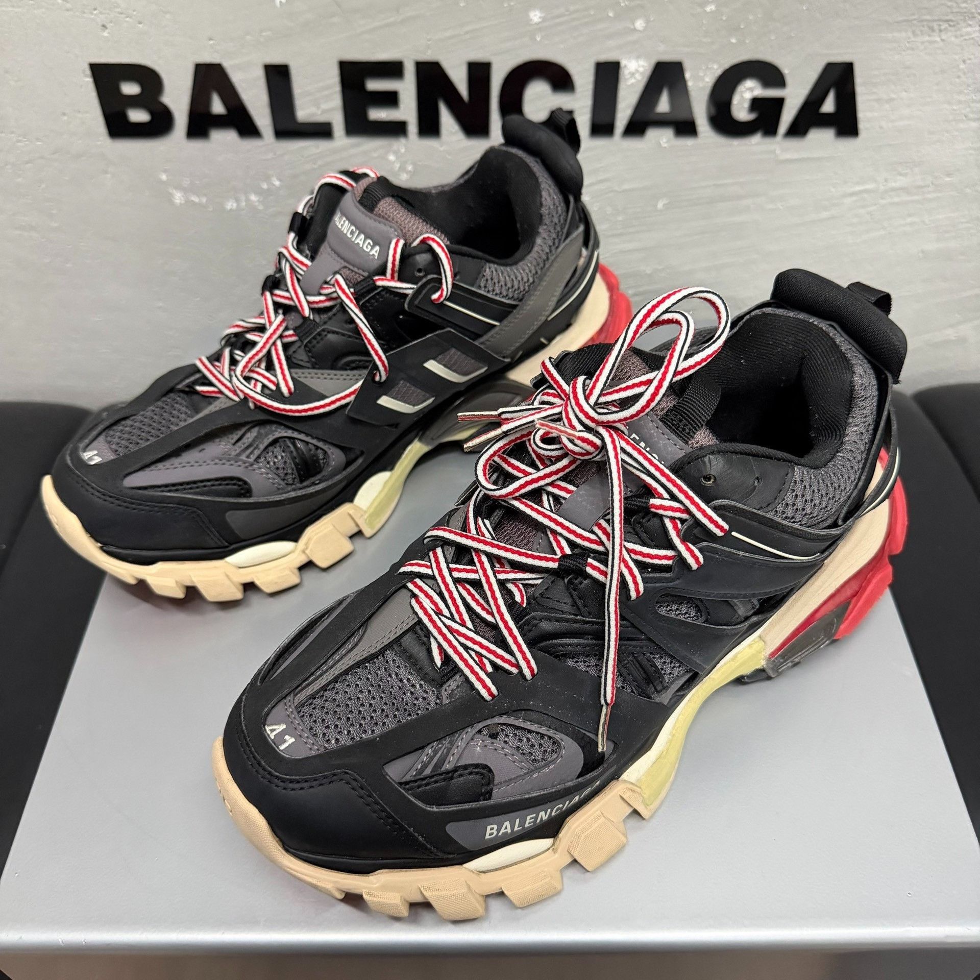 Balenciaga Balenciaga “black red” track sneakers | Grailed