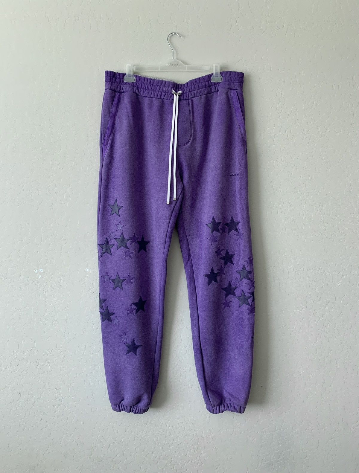 image of $2200 Amiri Pigment Star Sweatpants in Purple, Men's (Size 38)